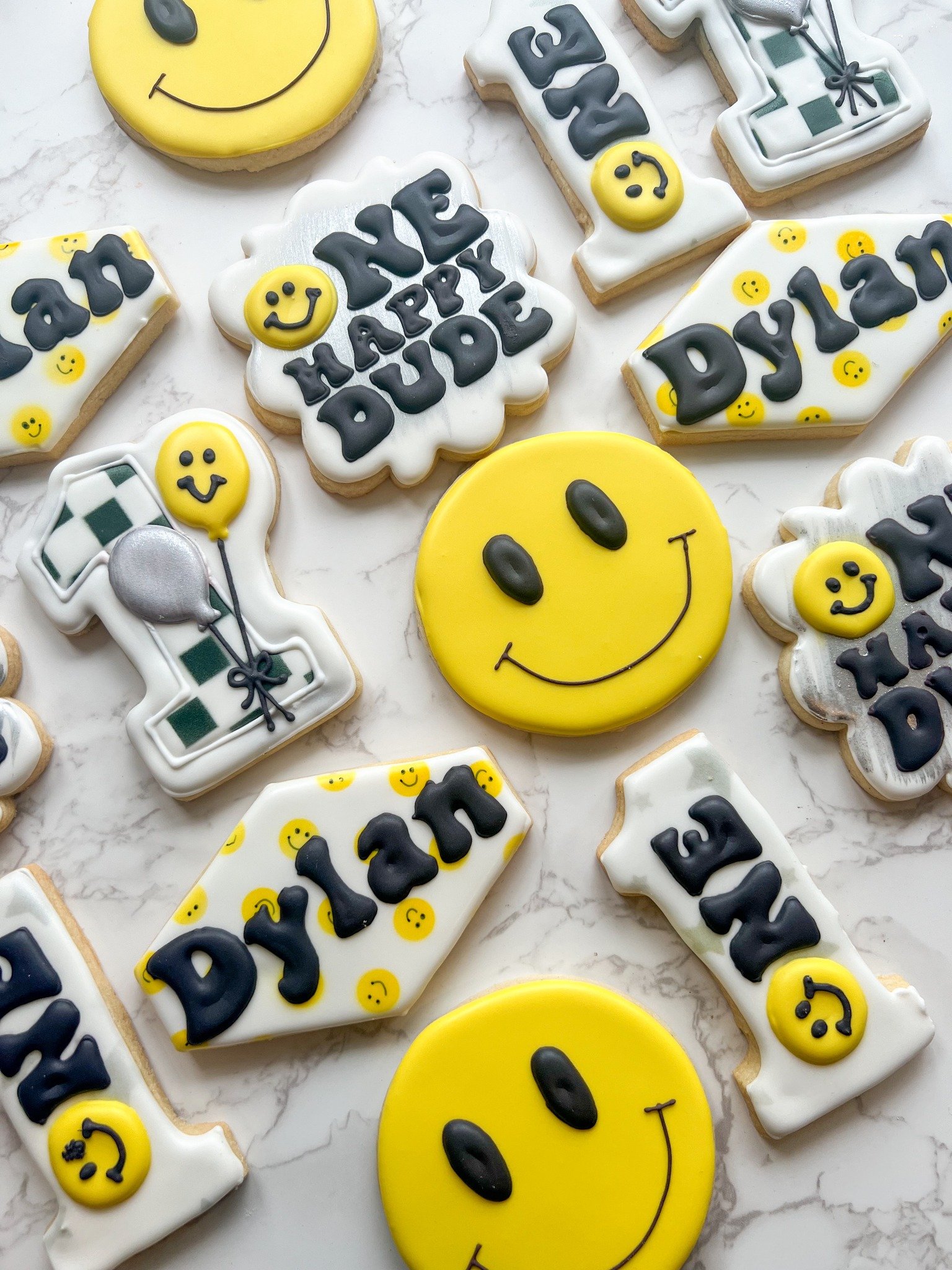😎☀️ One Cool Dude is turning ONE! ☀️😎

These One Cool Dude cookies are bringing all the fun with trendy sunglasses, smiley faces, checkerboard patterns, lightning bolts, and bright summer vibes&mdash;perfect for celebrating a little guy's first bir