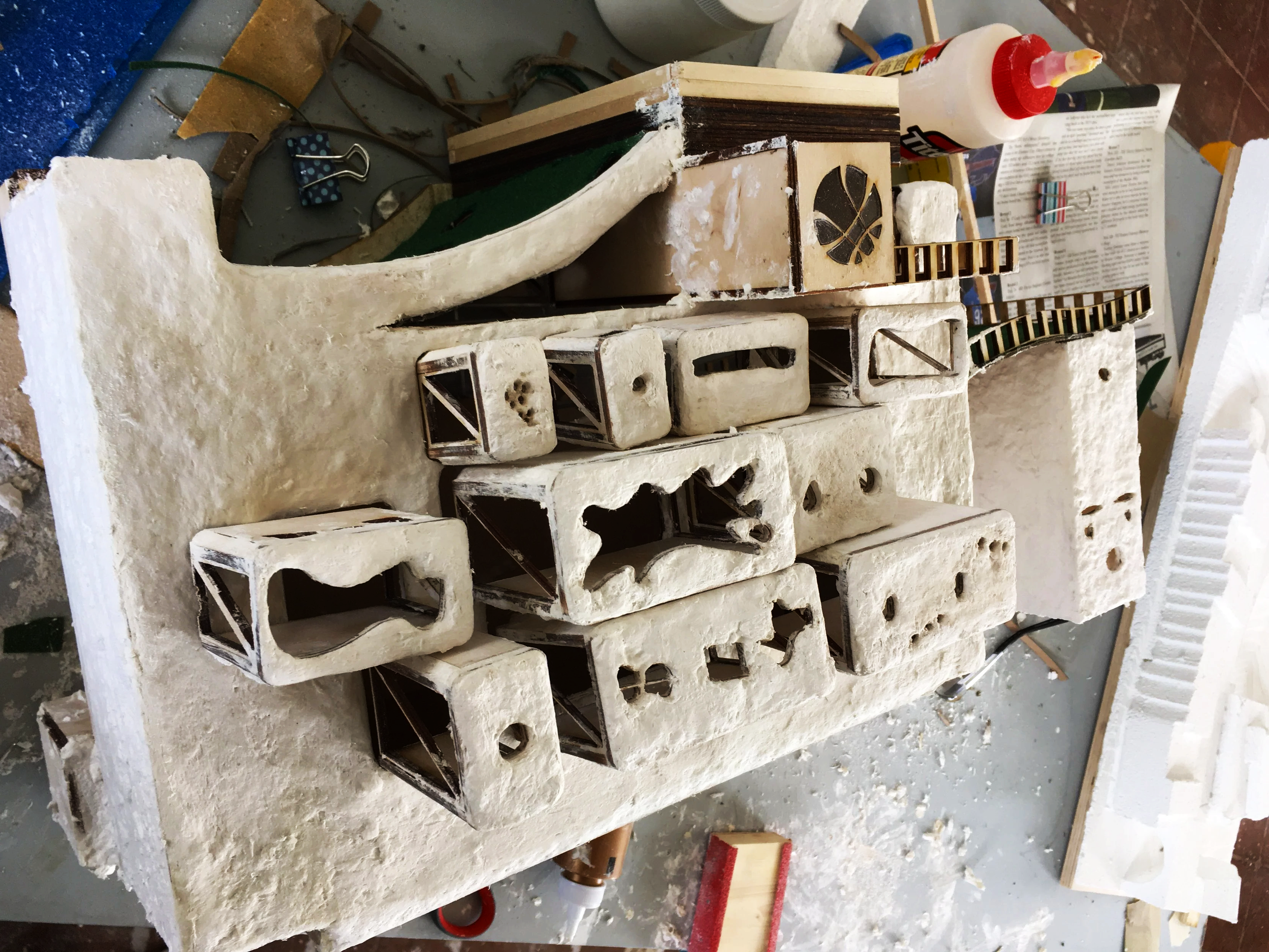 Paper mache is added to give texture and enhance its handmade qualities