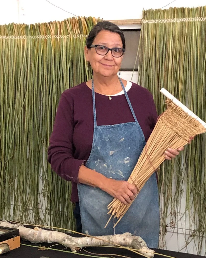 Melanie Tallmadge Saienz with weaving