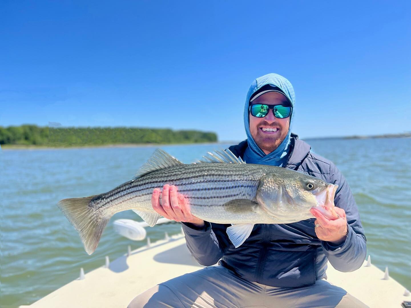 Josh with his first striper, first saltwater specie &amp; his PB fish on fly. Some gnarly winds but his smile says it all! #liveyourpassion