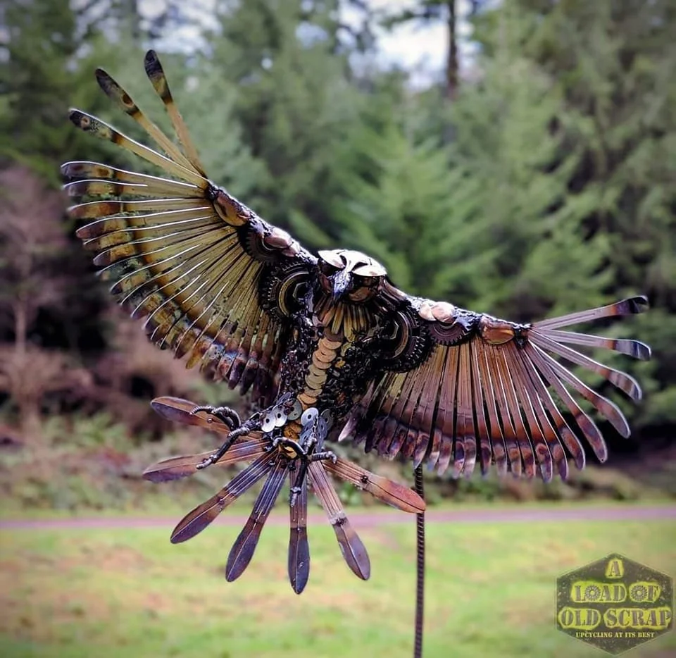 Scrap metal Harris hawk sculpture, wings made from knives head made from spoons and lots of old tools ,nut and bolts etc cut up to create a scrap mosaic for the body
