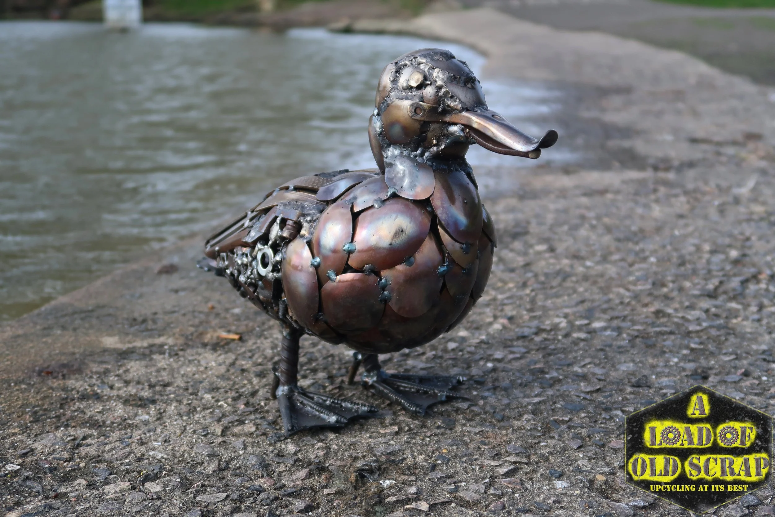 Scrap metal duck, lots of spoons used to create the breast and neck, mosaic scrap for the underneath and tools for the back.