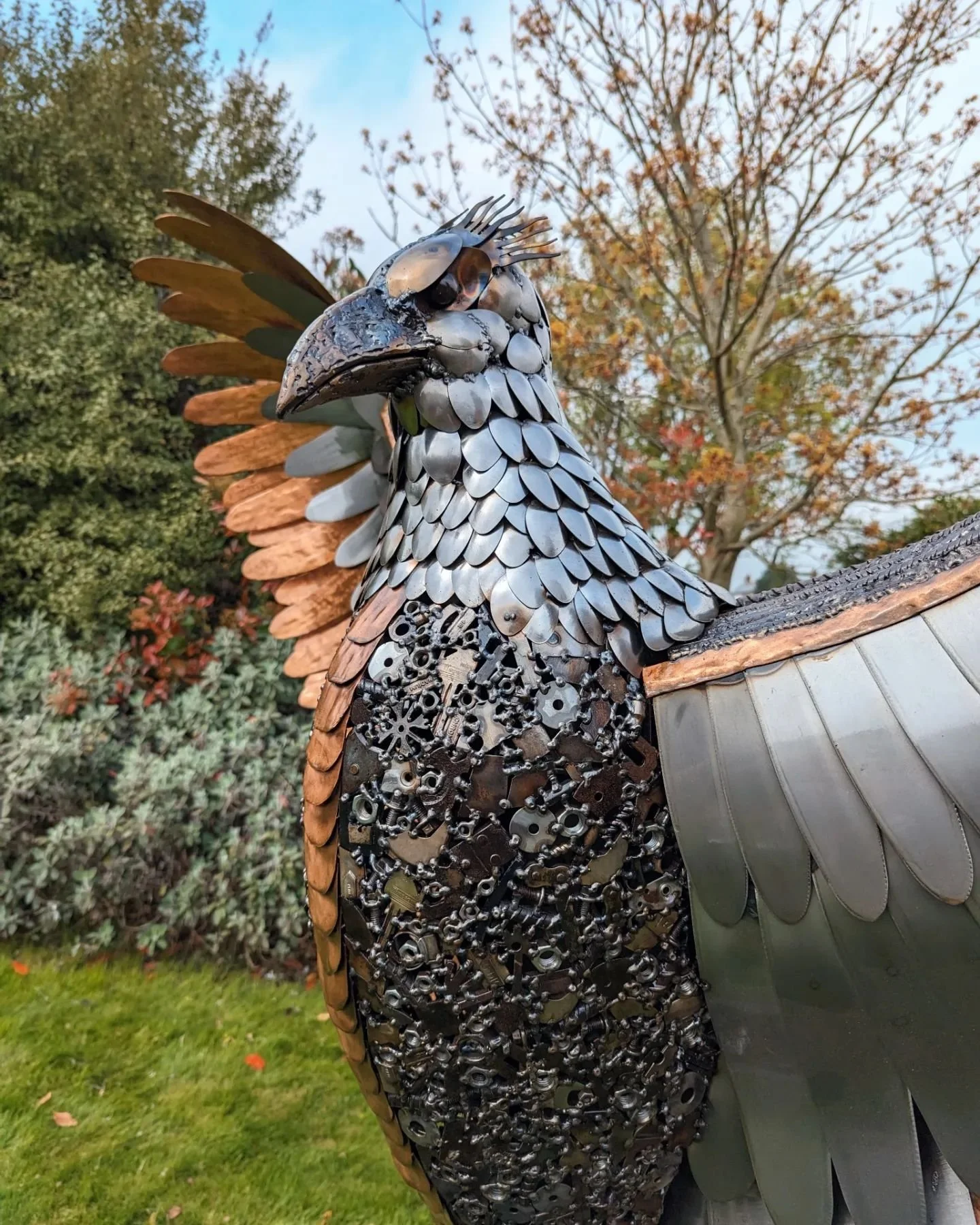 My latest Phoenix sculpture, steel and copper used to create a beautiful contrast of colours, the head and neck created using teaspoons and the body from scrap mosaic of cut up tools and discarded metal.