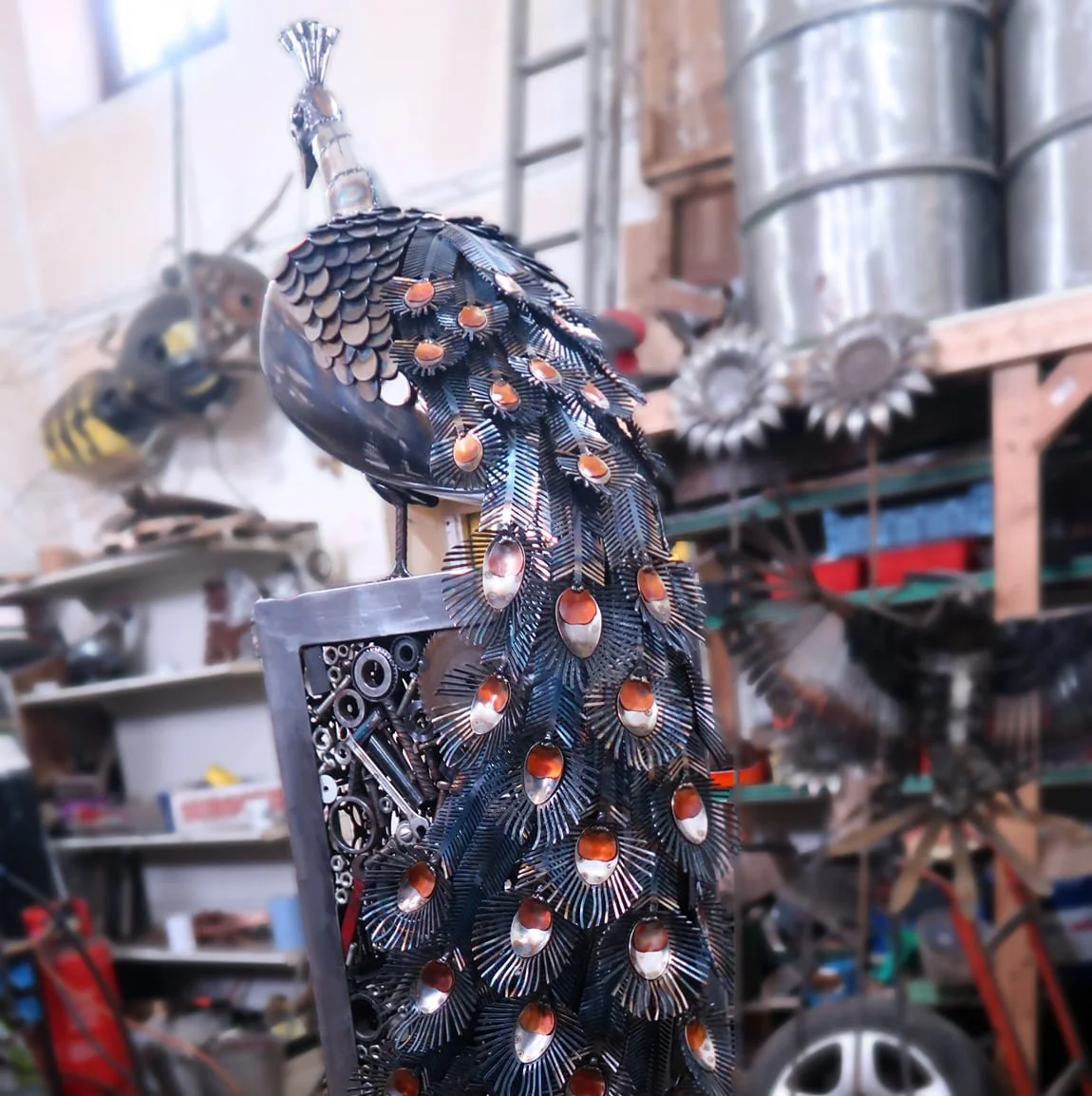 A metal Peacock sculpture created using a mixture of scrap and new materials, i used some copper on the tail feathers to add an element of contrast against the steel and stainless steel of the rest of the sculpture.