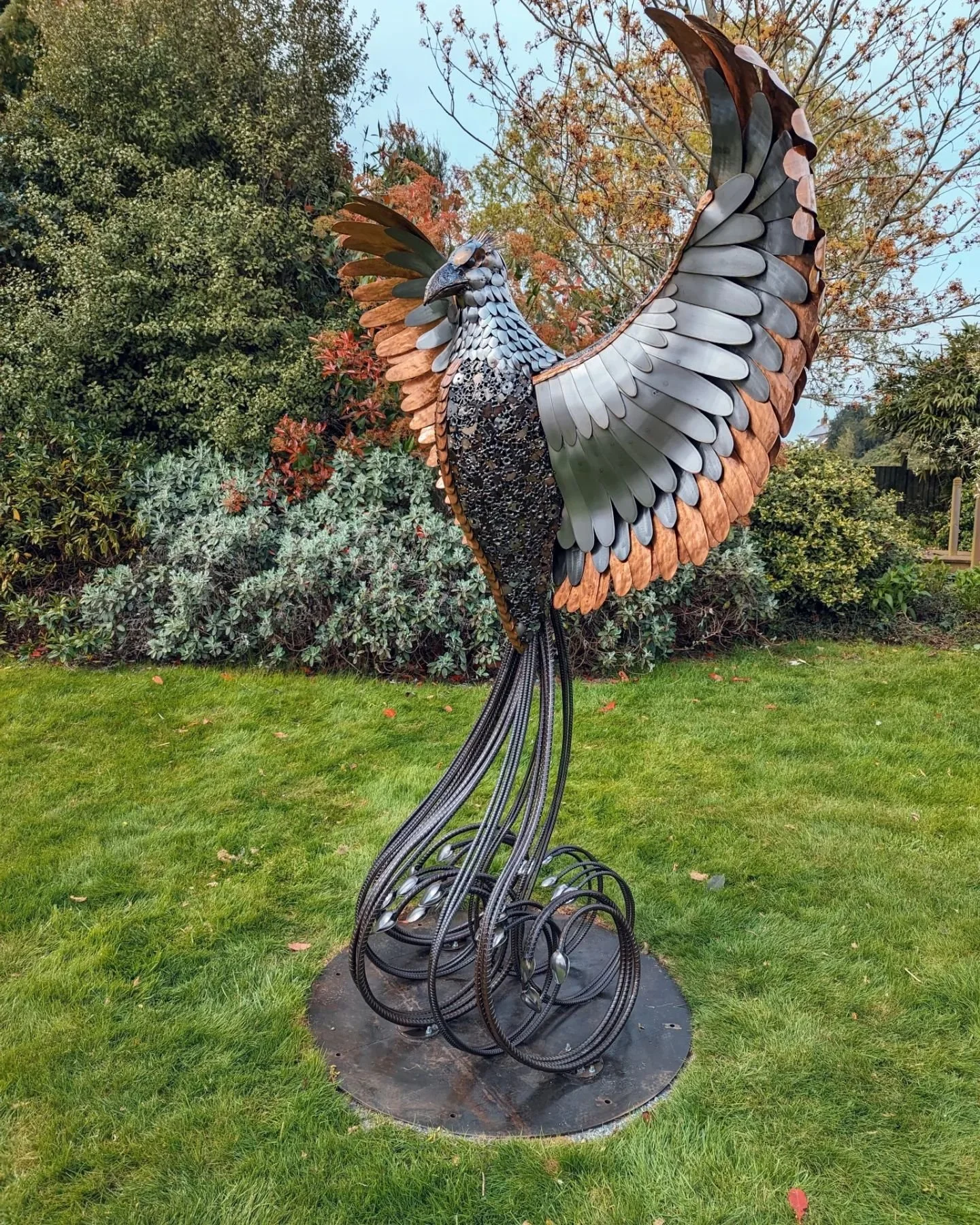 My latest Phoenix sculpture, steel and copper used to create a beautiful contrast of colours, the head and neck created using teaspoons and the body from scrap mosaic of cut up tools and discarded metal.
