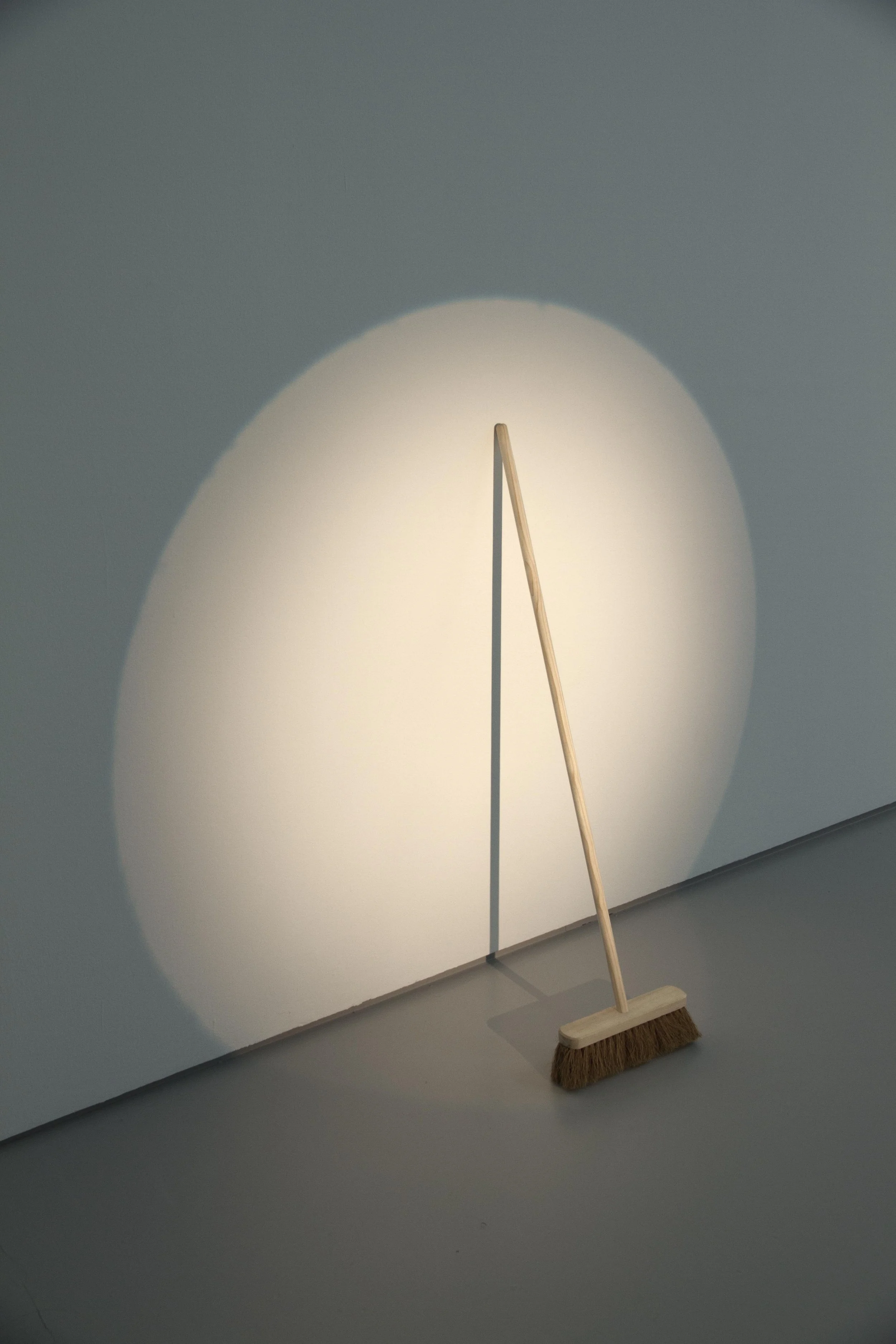 BROOM/WALL (2015) - wooden broom, spotlight