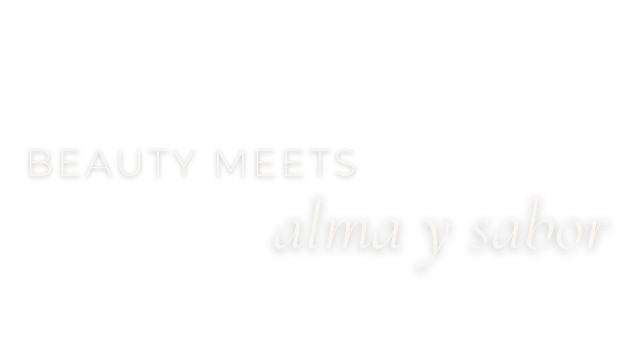 Text graphic with the phrase 'Beauty meets alma y sabor' in white font on a black background.