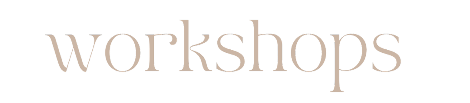 Text on a black background reading 'workshops' in beige font