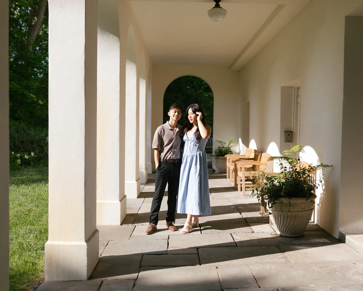 Engagement photos at the back of The Allée in the newfields gardens in indianapolis, indiana