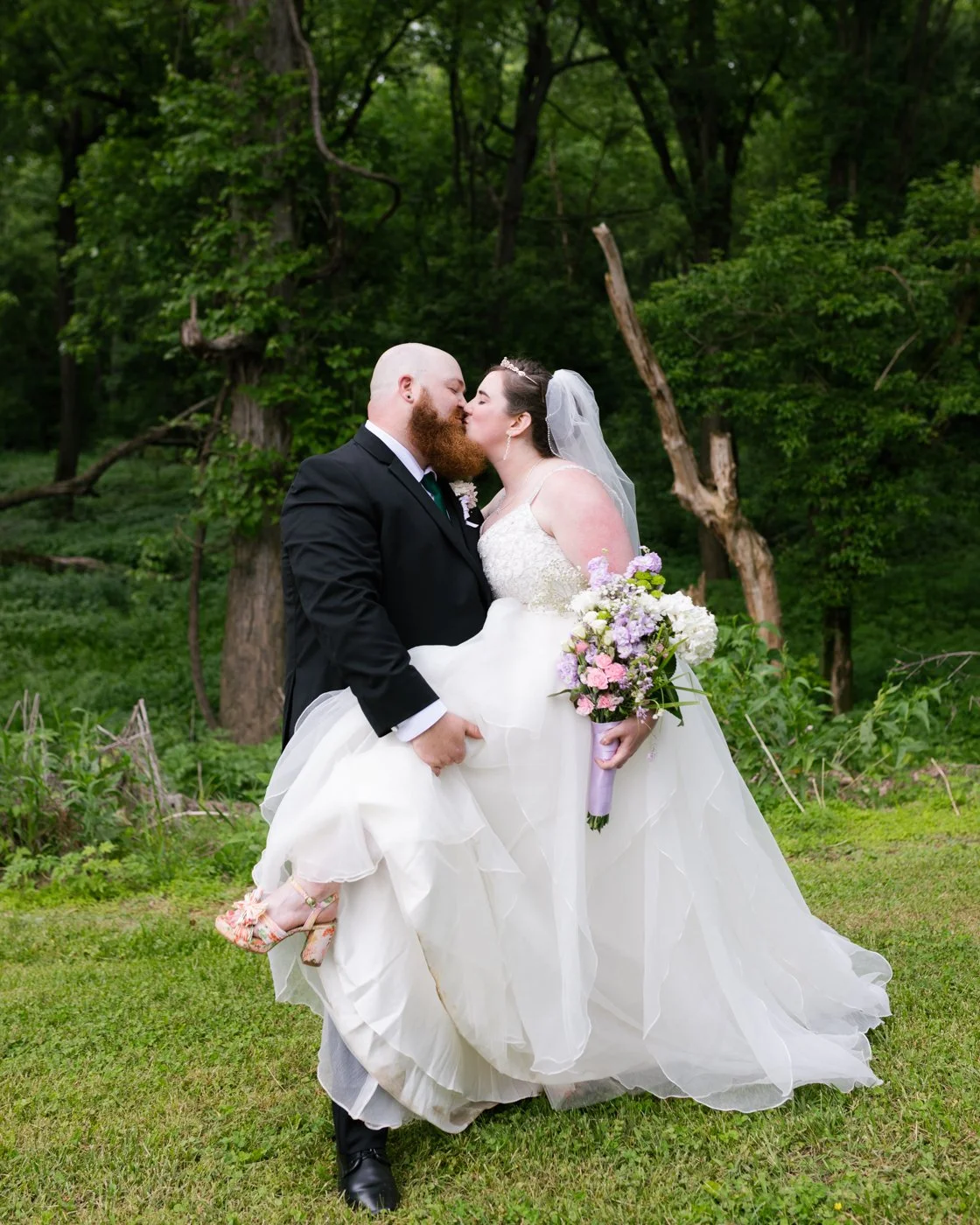 A few photos from previews I sent over to Chase and Heather from their super sweet Spencer, Indiana wedding. Outside of a cabin just on the edge of McCormick's Creek State Park. Lots of friends and family.