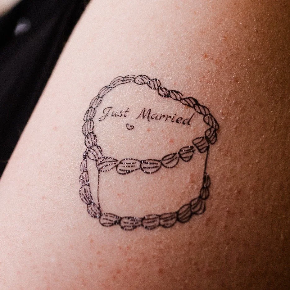 Temporary tattoos at Mads and Eleanor's wedding last year.