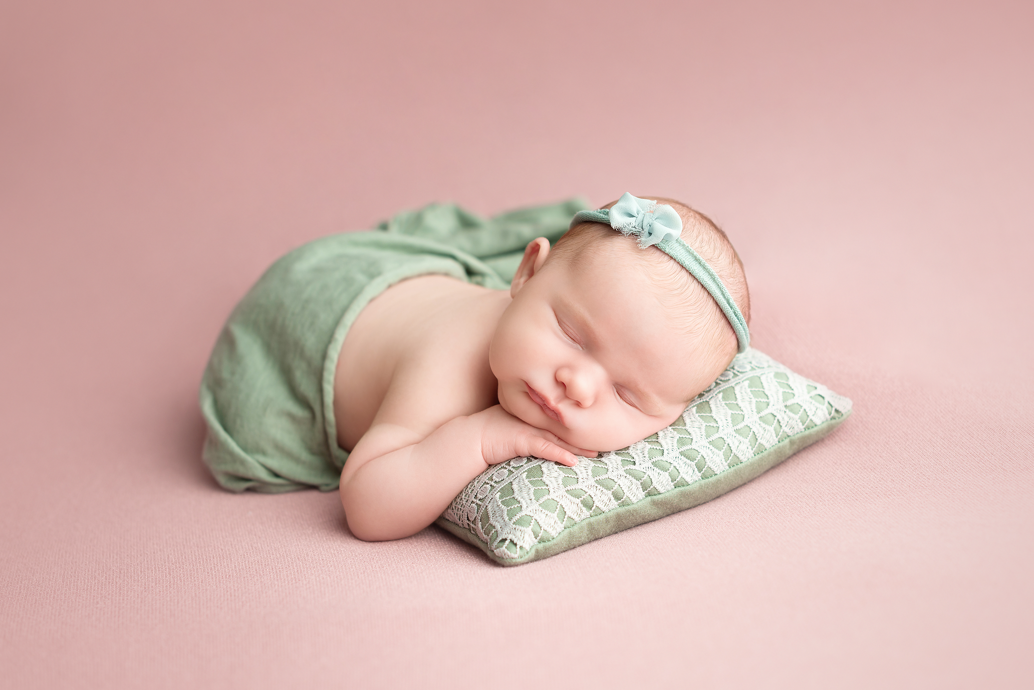 A Soft and Sentimental Newborn Photography Session in Pink and Sage Green