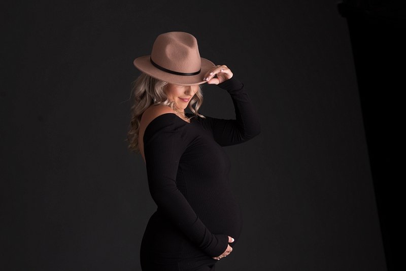 pregnant mother in black dress