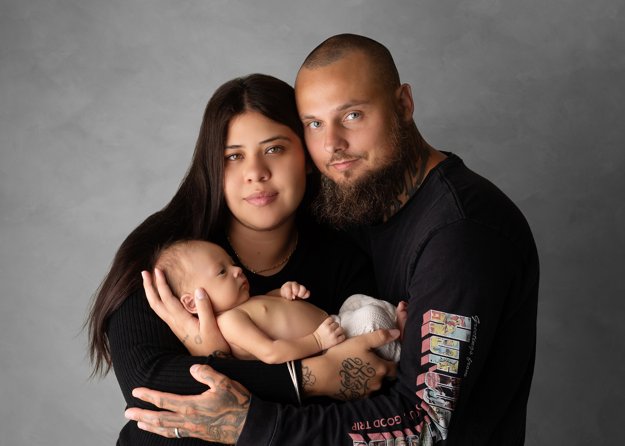 newborn with her parents in Kingston studio