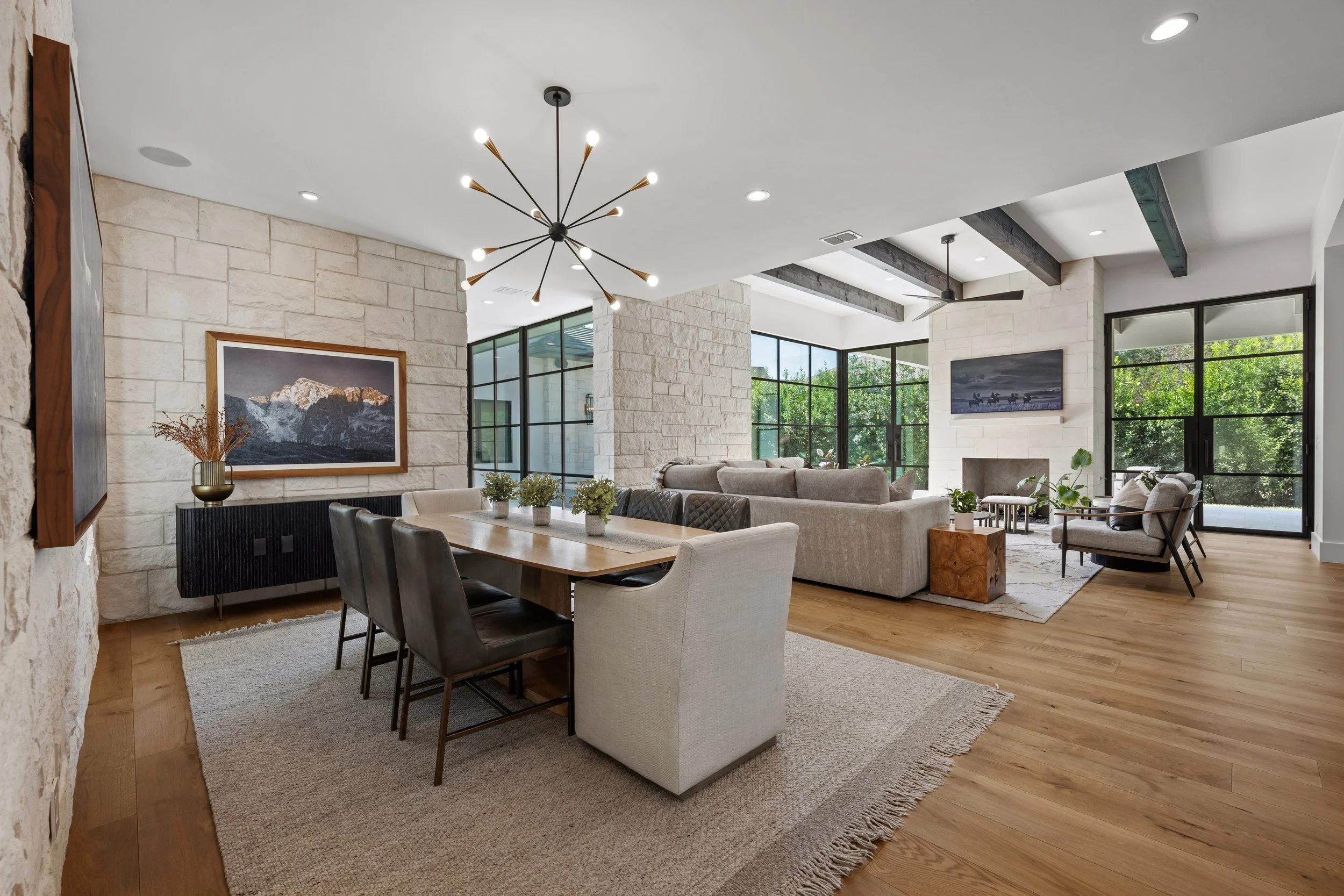 Interior photo of a contemporary Austin home showcasing the dining and living rooms