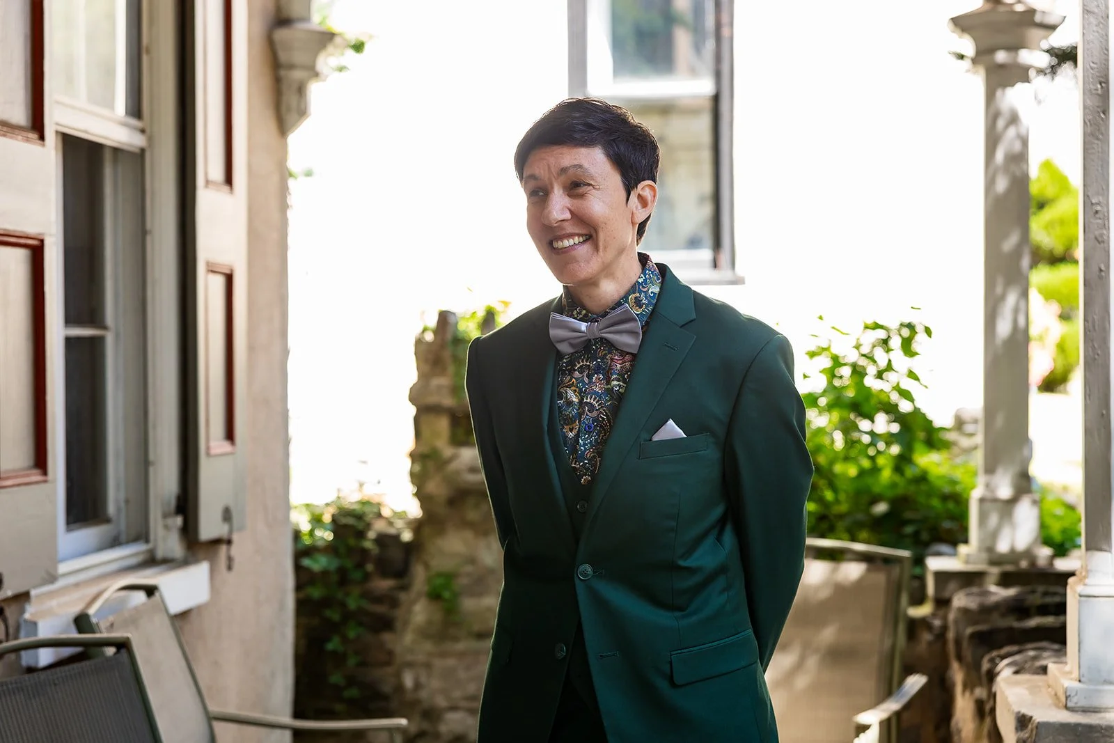 Teal suit and colorful shirt