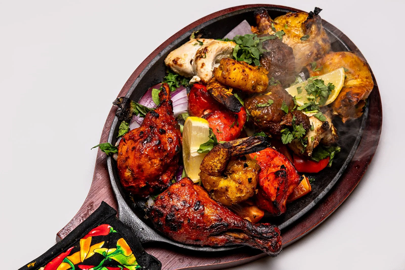 Steaming hot Indian food dish from Cross Culture in Haddonfield NJ