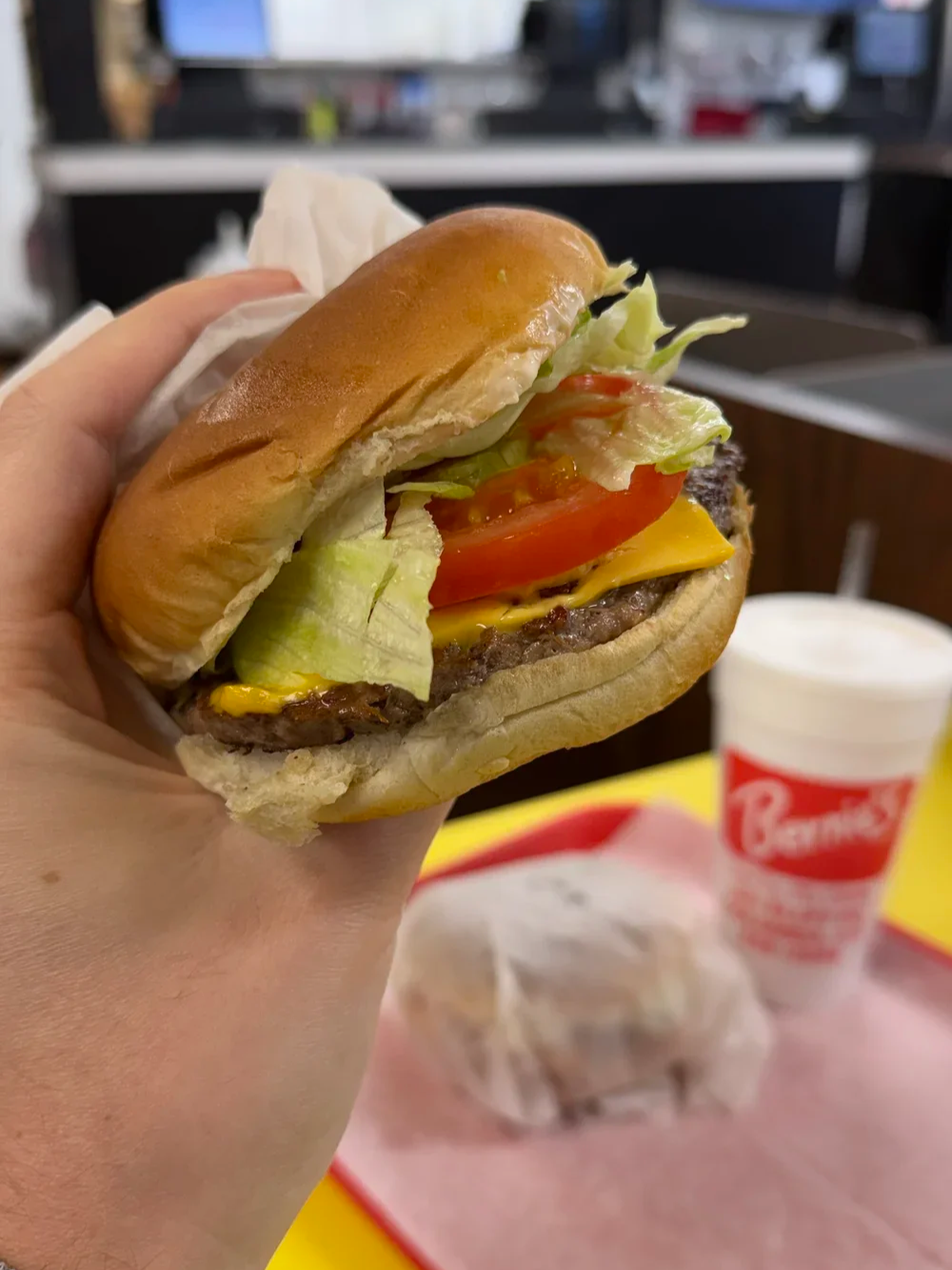 Double cheeseburger held up at Bernie's Chicken in Columbia, SC