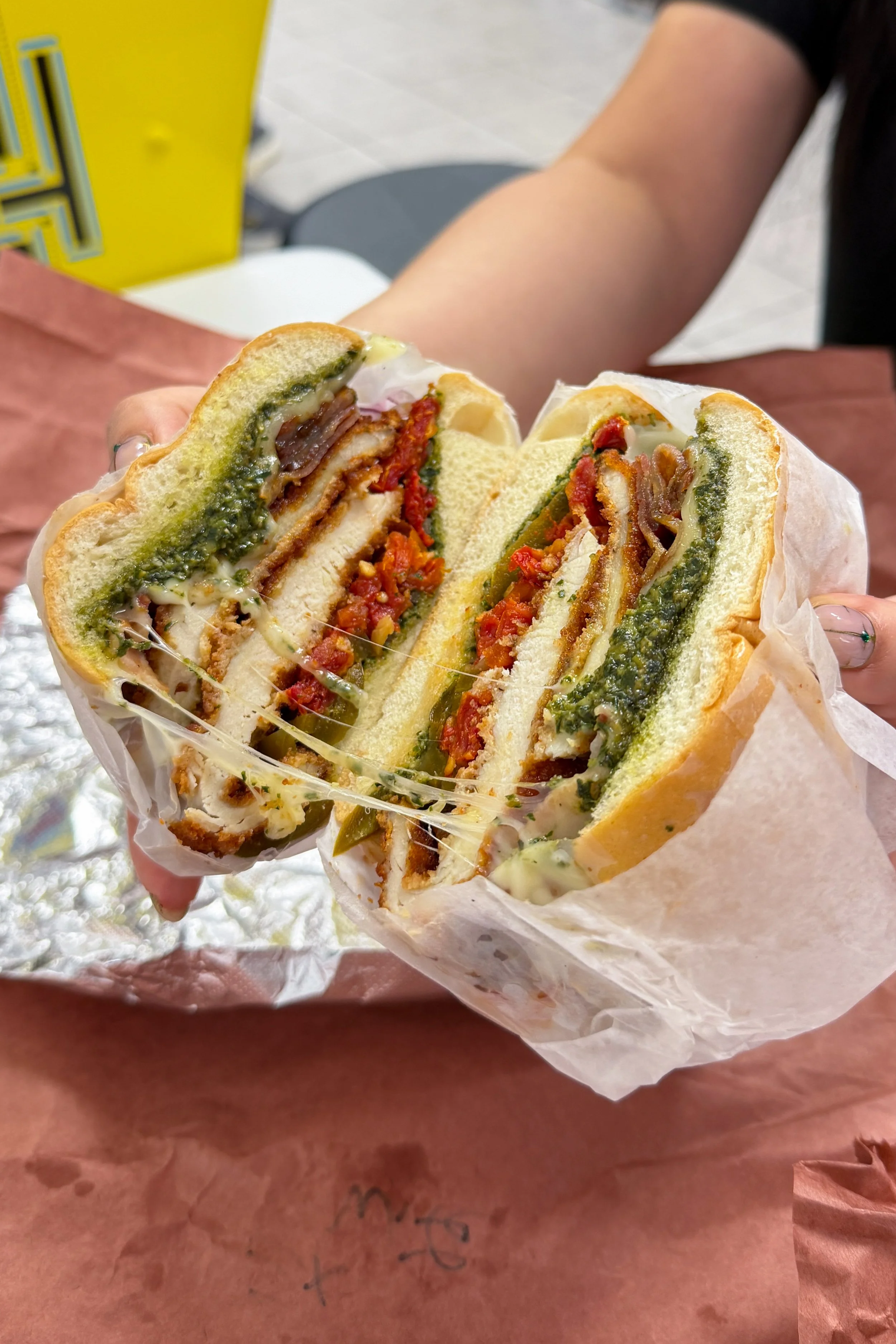 The Fatboy sandwich at Mochi's Deli in Charlotte, a chicken cutlet loaded with mozzarella, bacon, and fries
