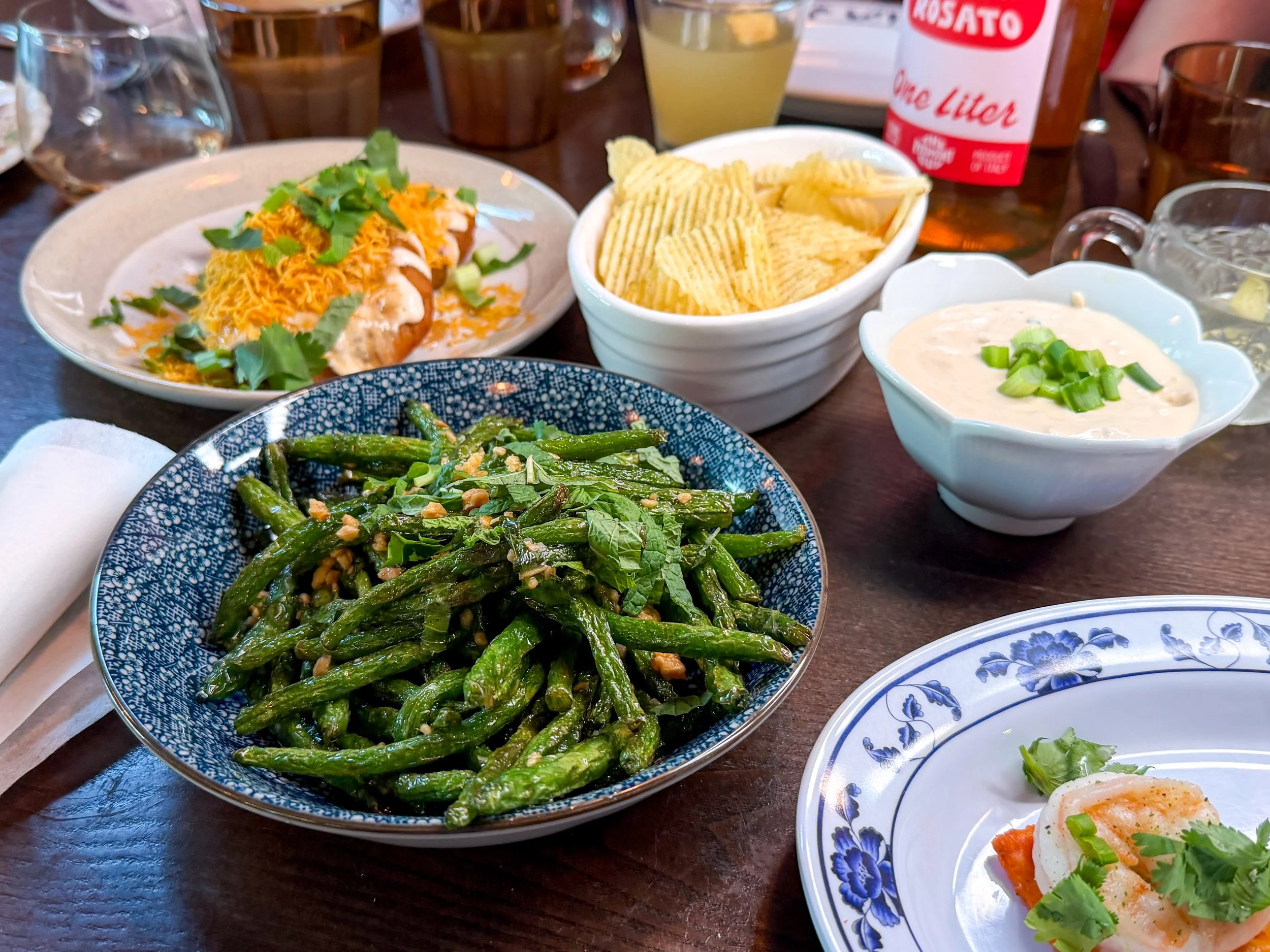 Miso butter green beans with fresh mint and fried garlic at Little Secret in Greenville, SC