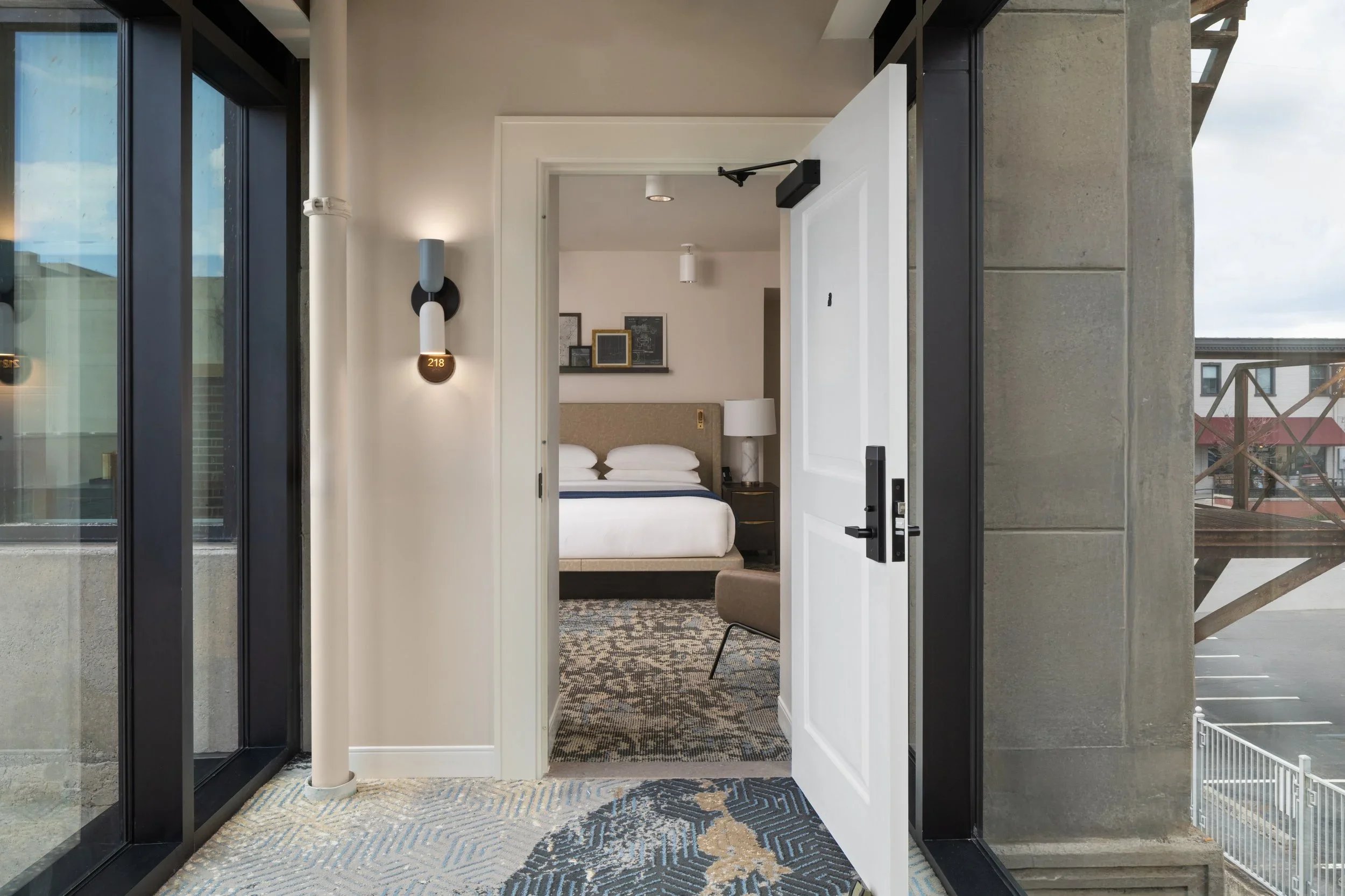 Entryway view into the Premium King Tower room at The Lantern Hotel in Columbia