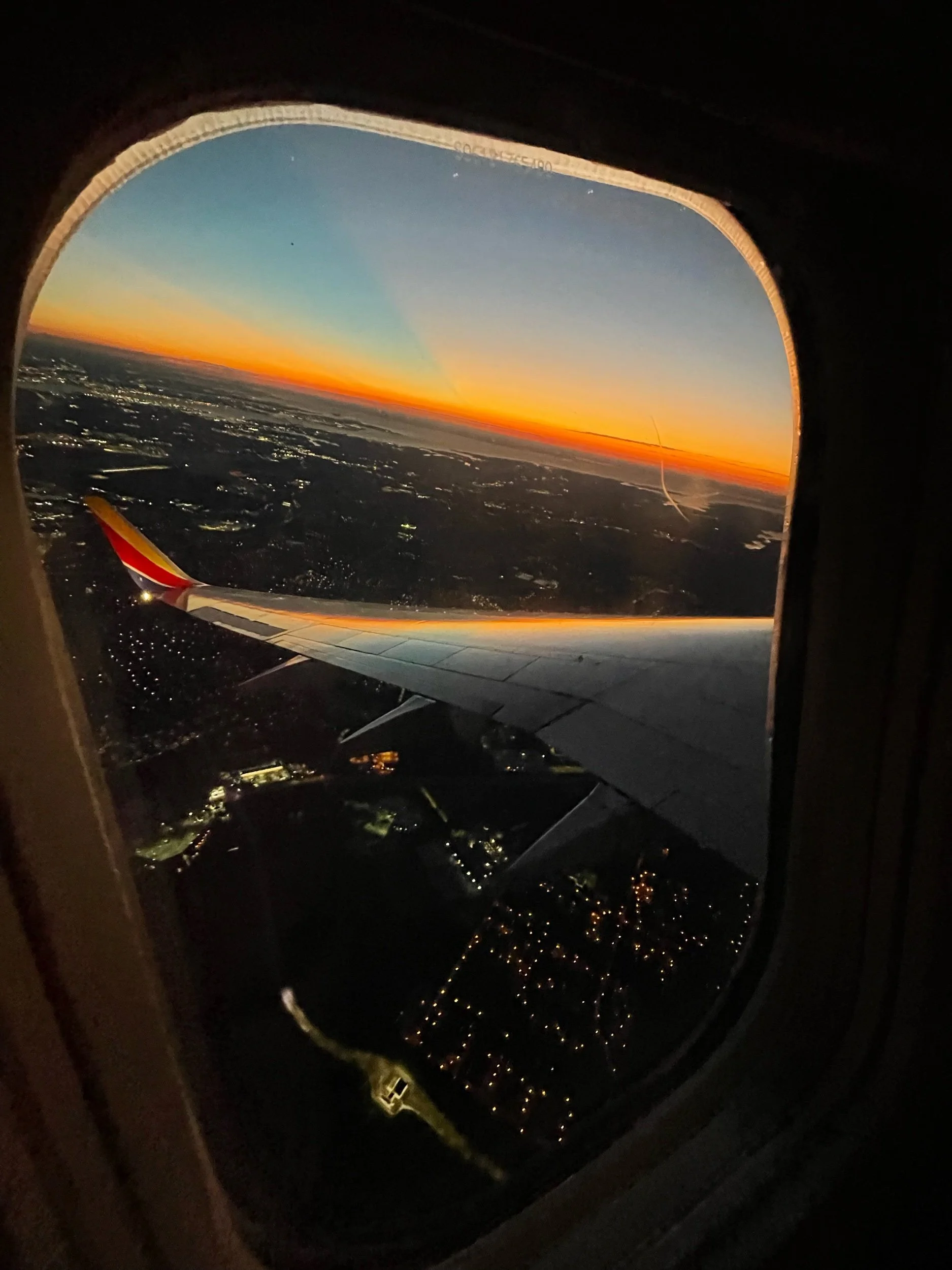 window-seat-airplane-sunrise.jpeg
