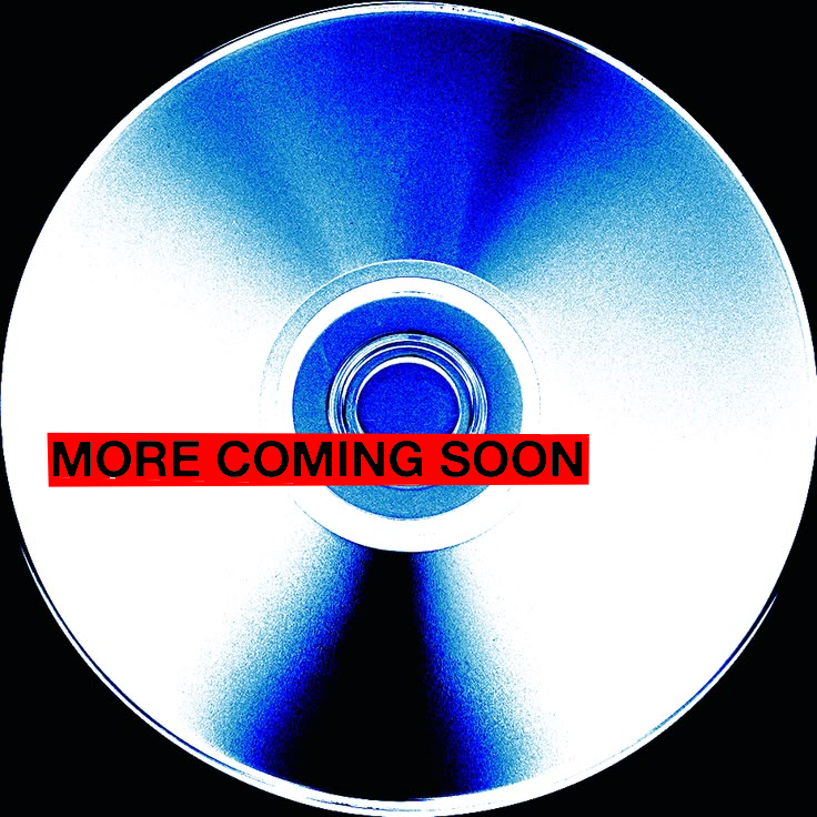 A compact disc with a red label that reads 'MORE COMING SOON' in black text.