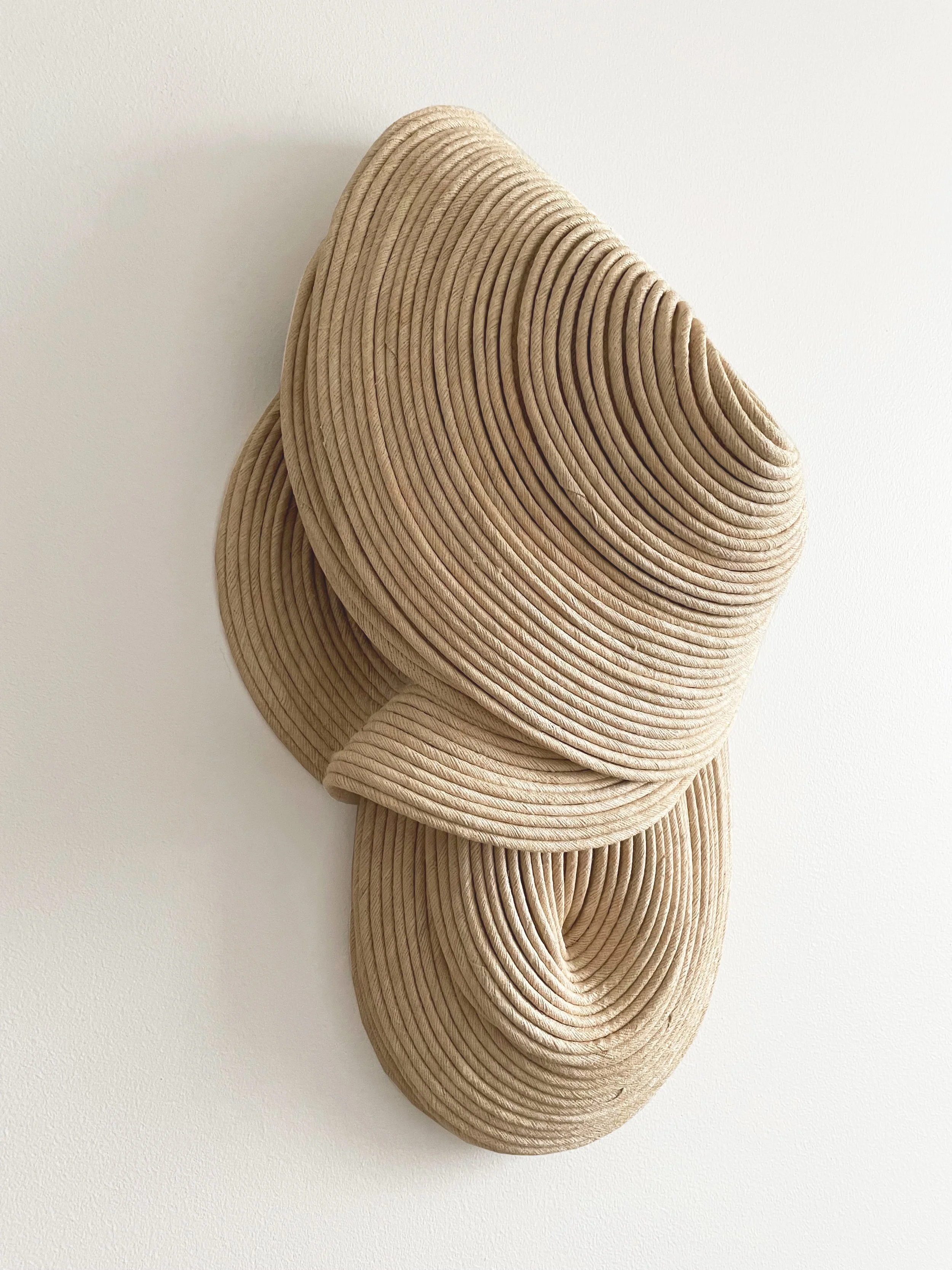 Shore, 2022. 51x31x18cm. Wild, undyed, handwoven silk & recycled cotton cord. Backing hardened. Sold.