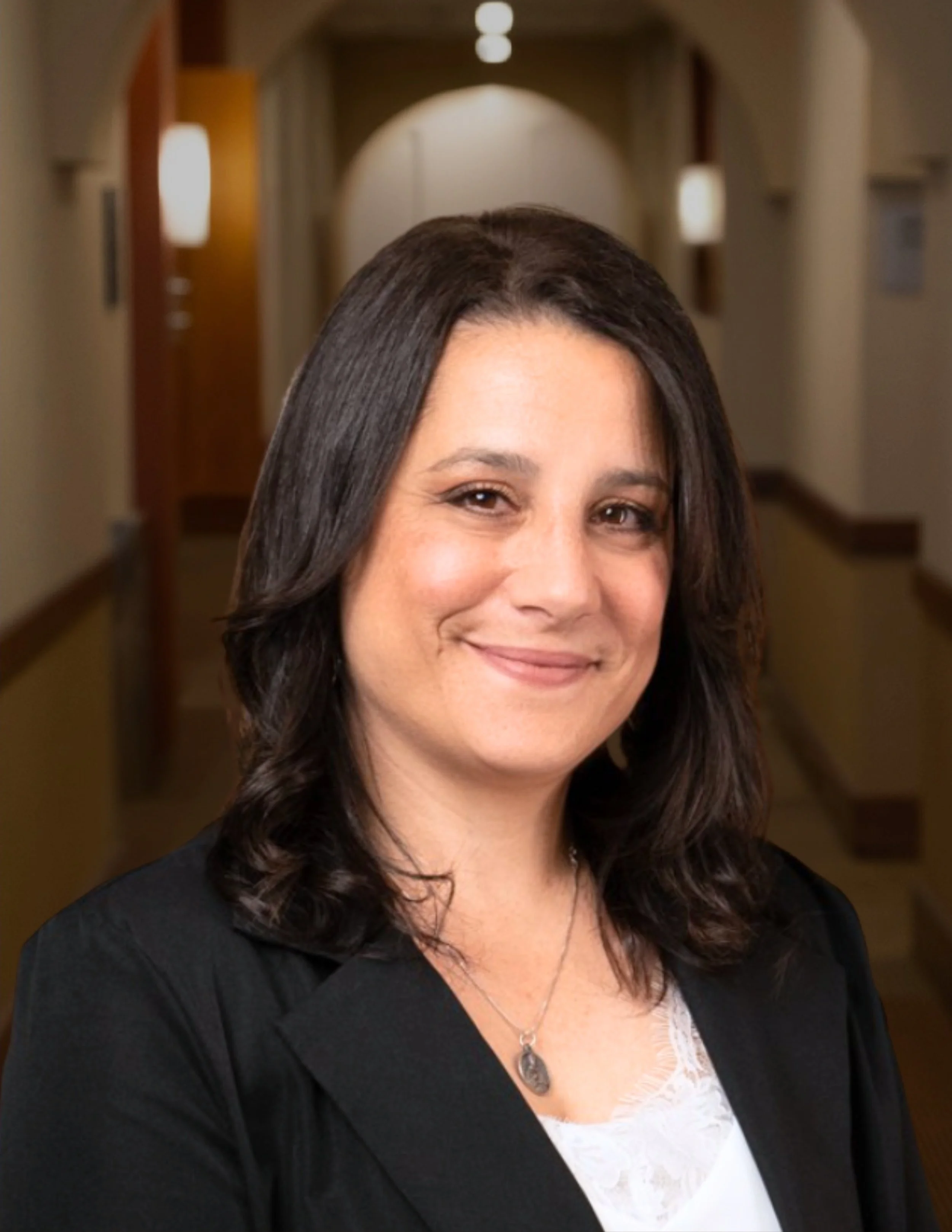 Raffaella Stein, licensed real estate agent at Inluxxe Realty New York providing personalized client service, professional headshot