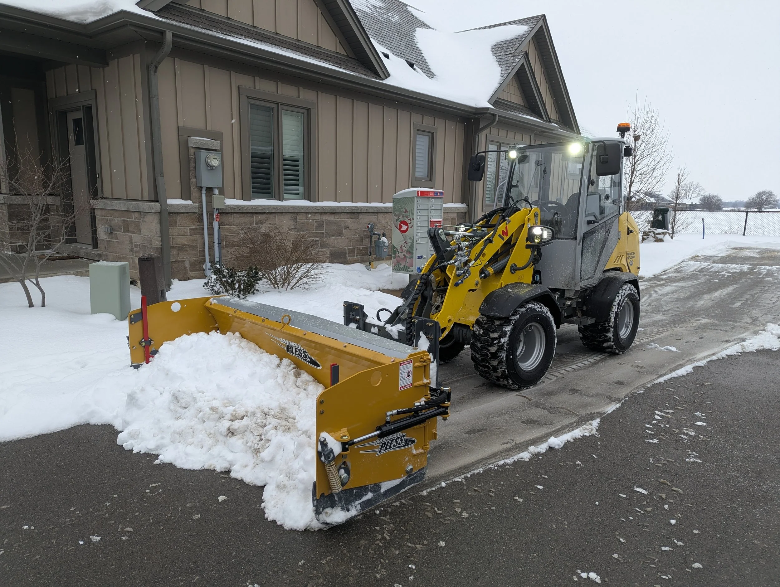 Clearing snow in Smithiville 