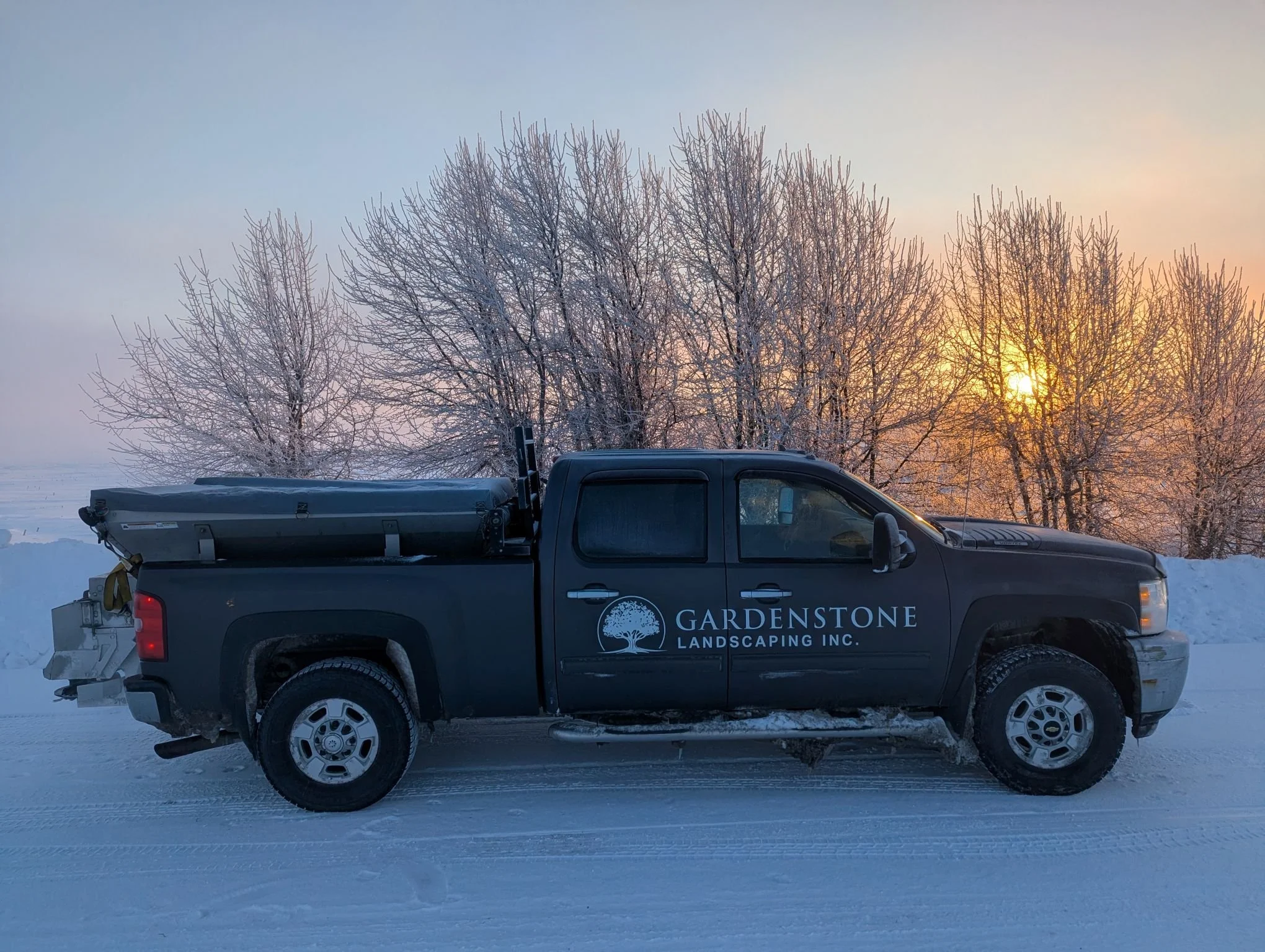 Gardenstone Landscaping truck out salting on a frosty morning
