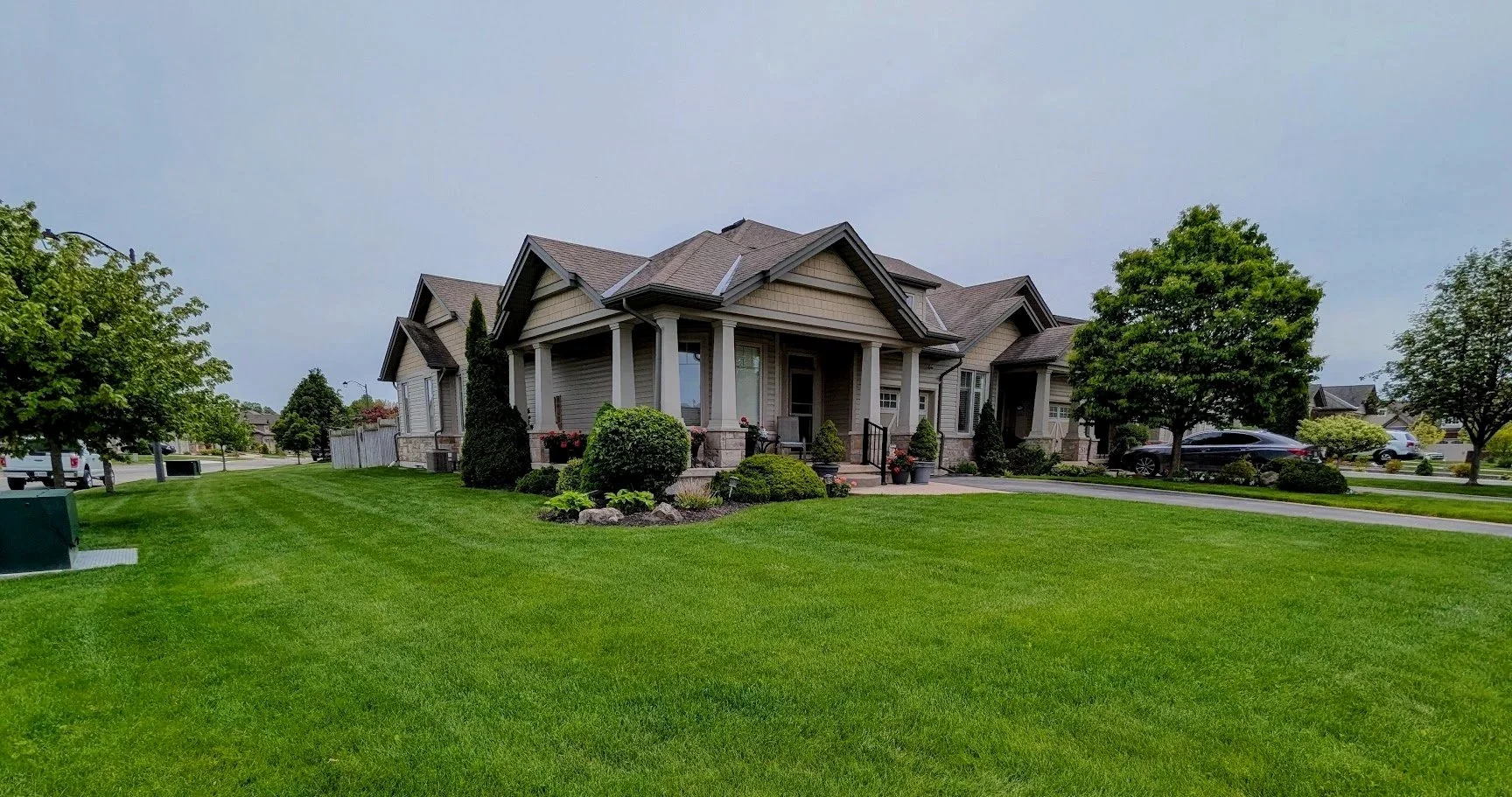 Lush Smithville yard with professional mowing stripes and manicured edges.