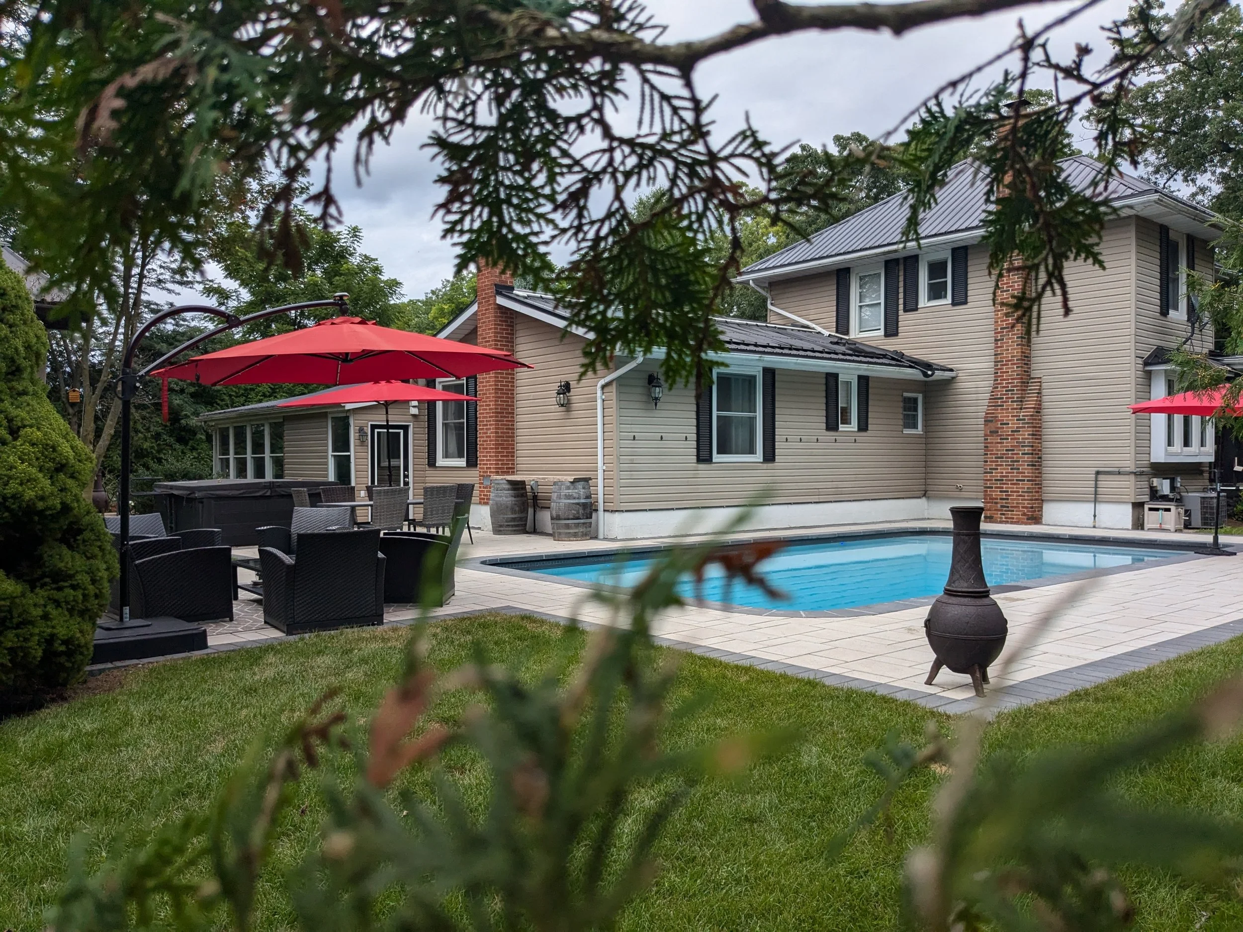 Inground swimming pool, Techo-Bloc Blu 60 stone paver patio.