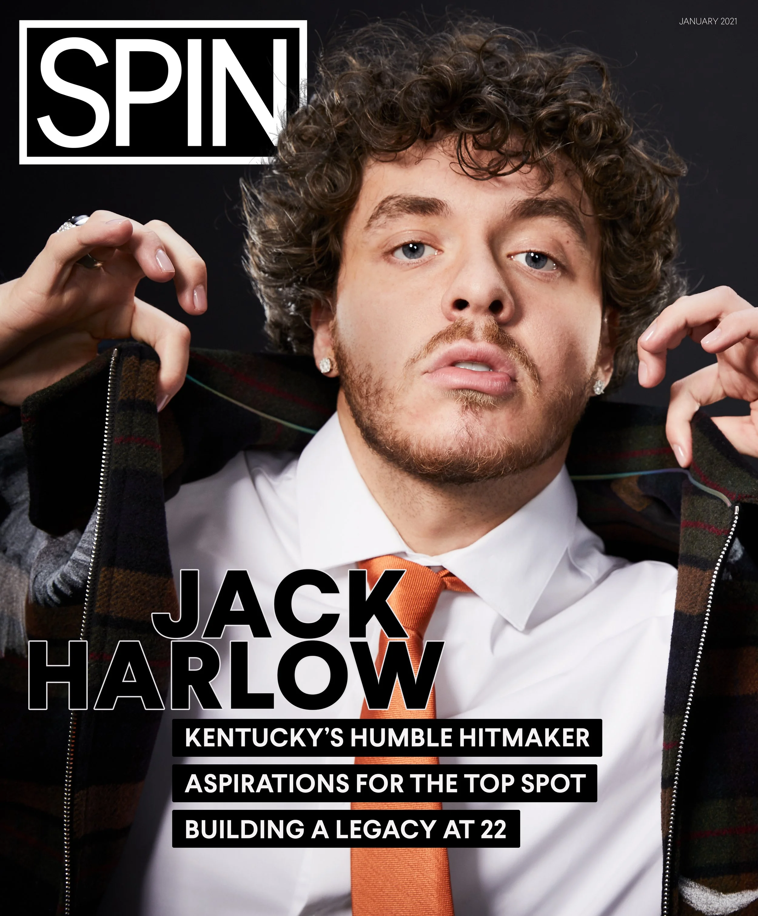 Magazine cover featuring Jack Harlow with curly hair, dress shirt, orange tie, and earrings, against a black background, with text highlighting his background and aspirations, January 2021.
