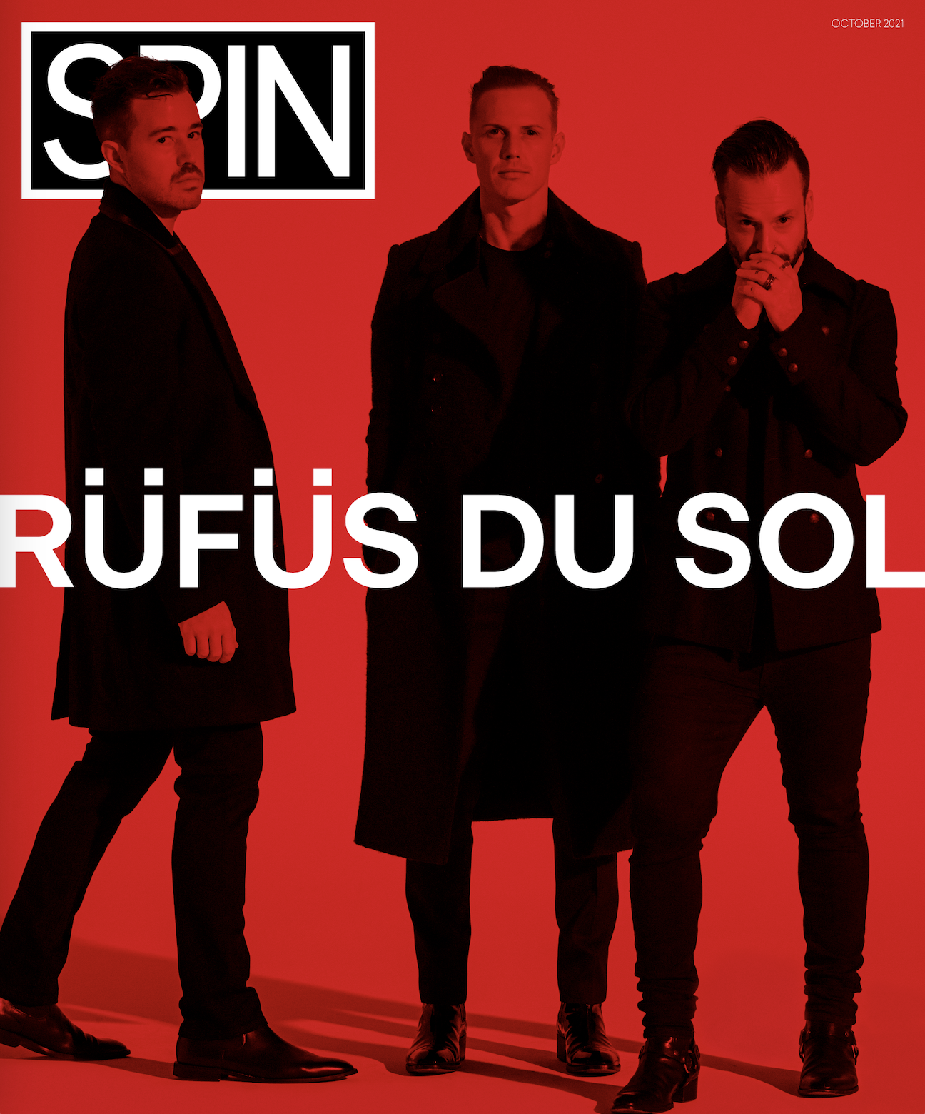Magazine cover featuring three men in black clothing against a red background. The word 'SPIN' is at the top, and the text 'RÜFÜS DU SOL' spans across the middle of the cover.