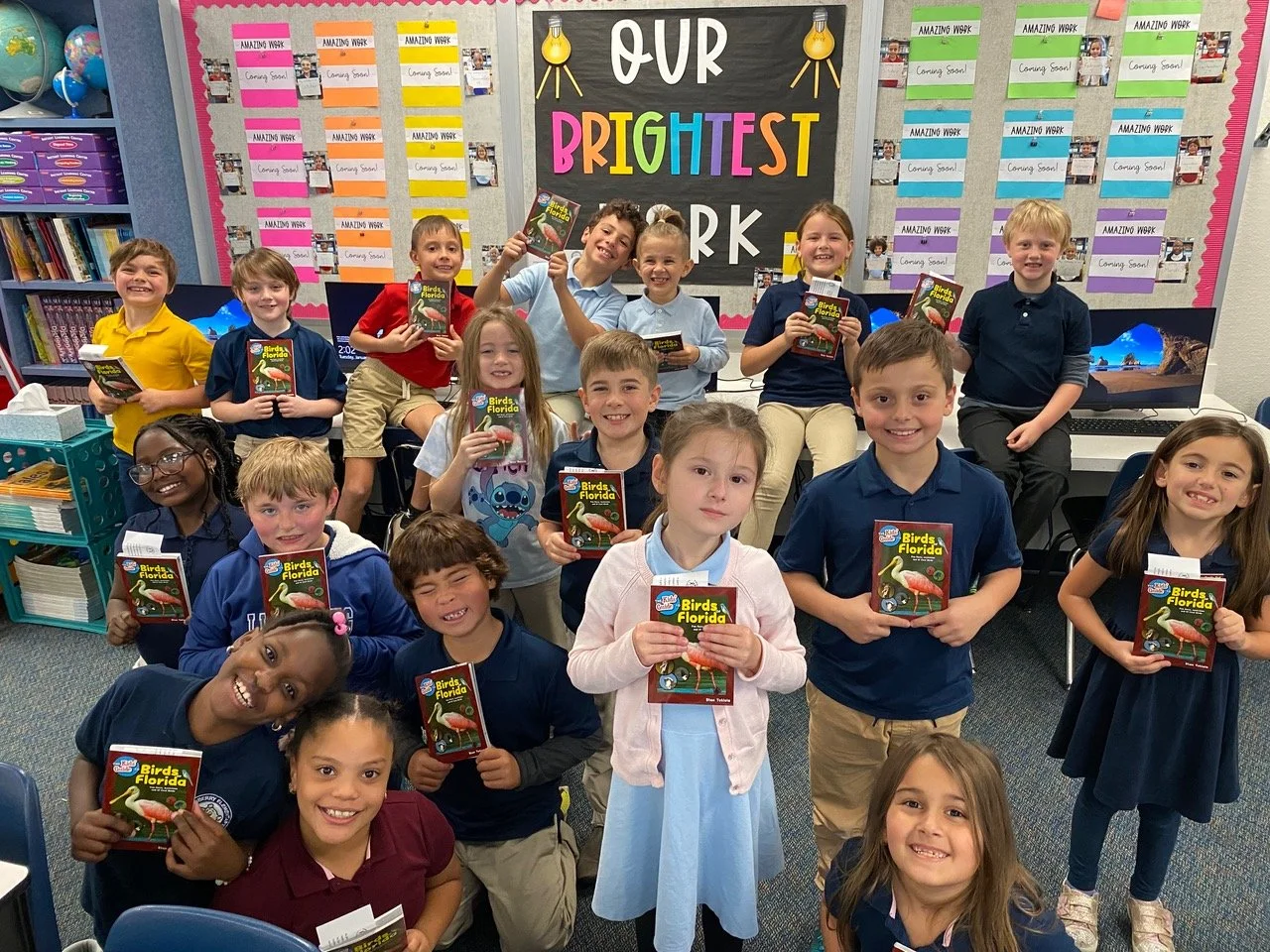 Photo 1_in the classroom with books.jpg