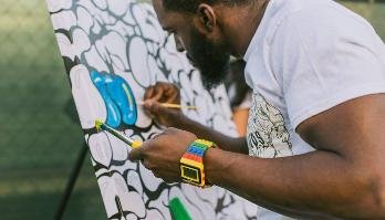 Artist live painting at an event
