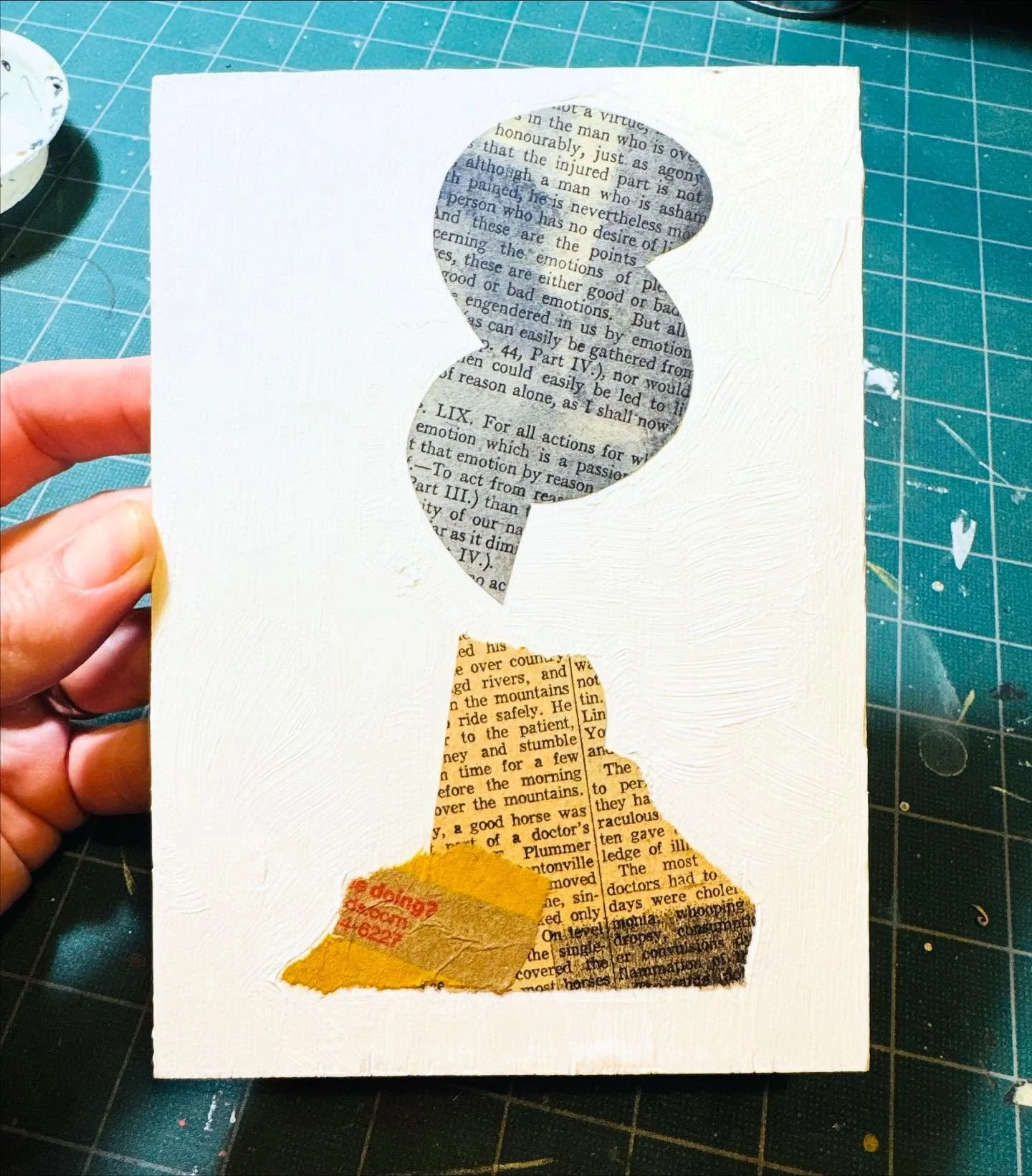 I’m cleaning around the collage table this morning and found three scraps on the floor that spoke to me. 
This is, by far, the simplest collage I’ve ever made. 🌋