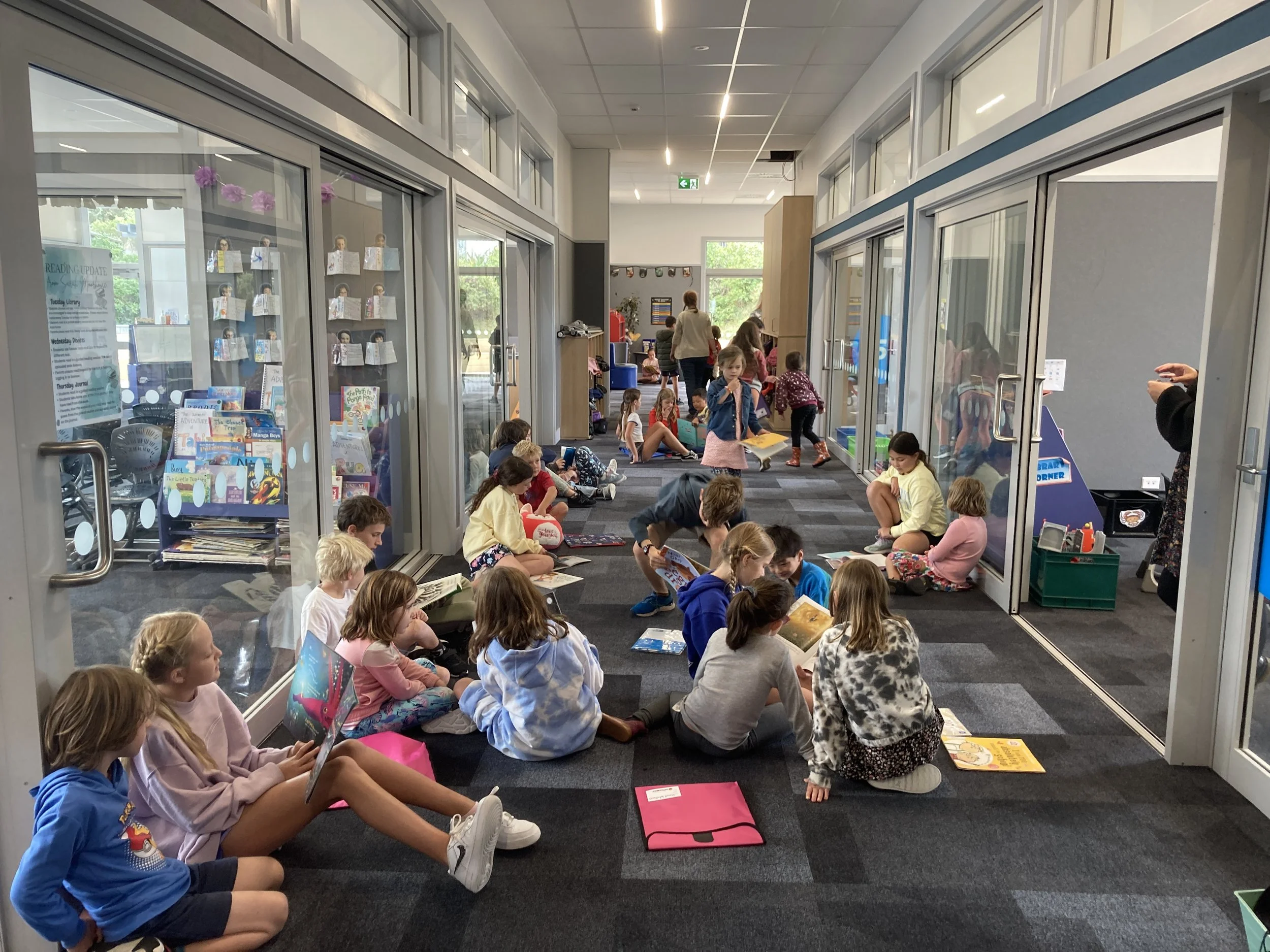 Buddy reading with Papatūānuku in the new block