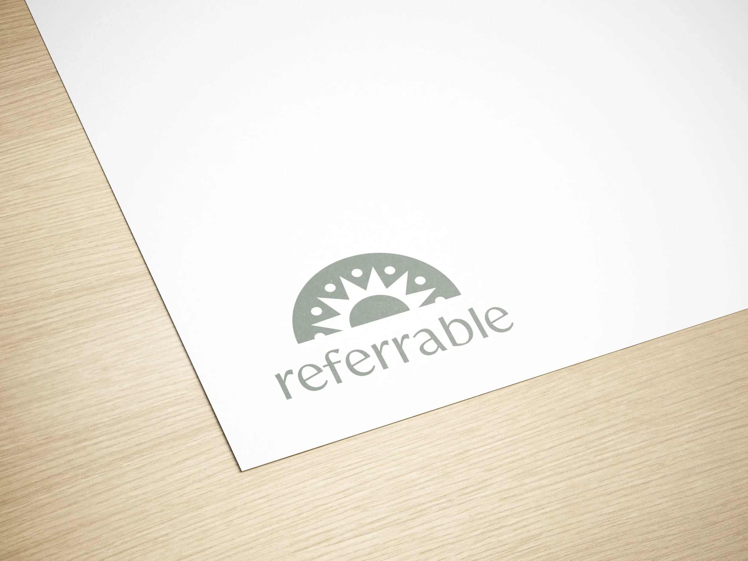Referrable is a company that refers mental health professionals and general practitioners easily and securely. This logo depicts new beginnings and connection through the sun motif.