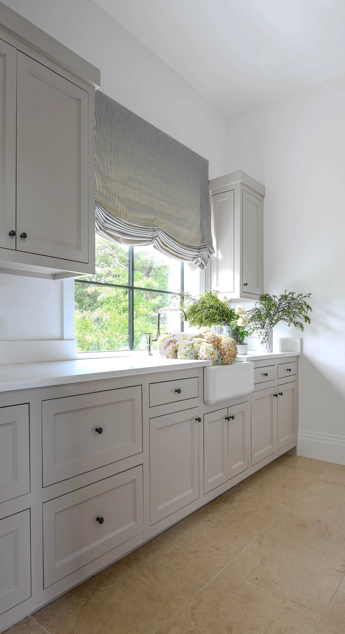 greige-laundry-room-cabinets-apron-sink.JPG