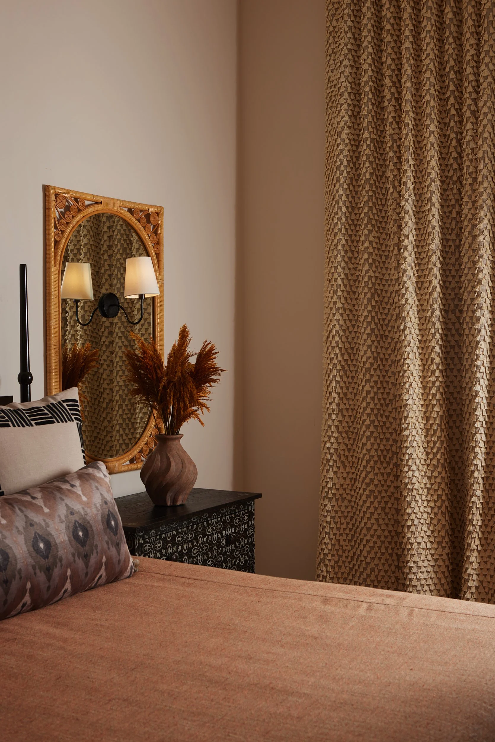 dana-wiseman-magnolia-bedroom-rattan-mirror-nightstand.jpg