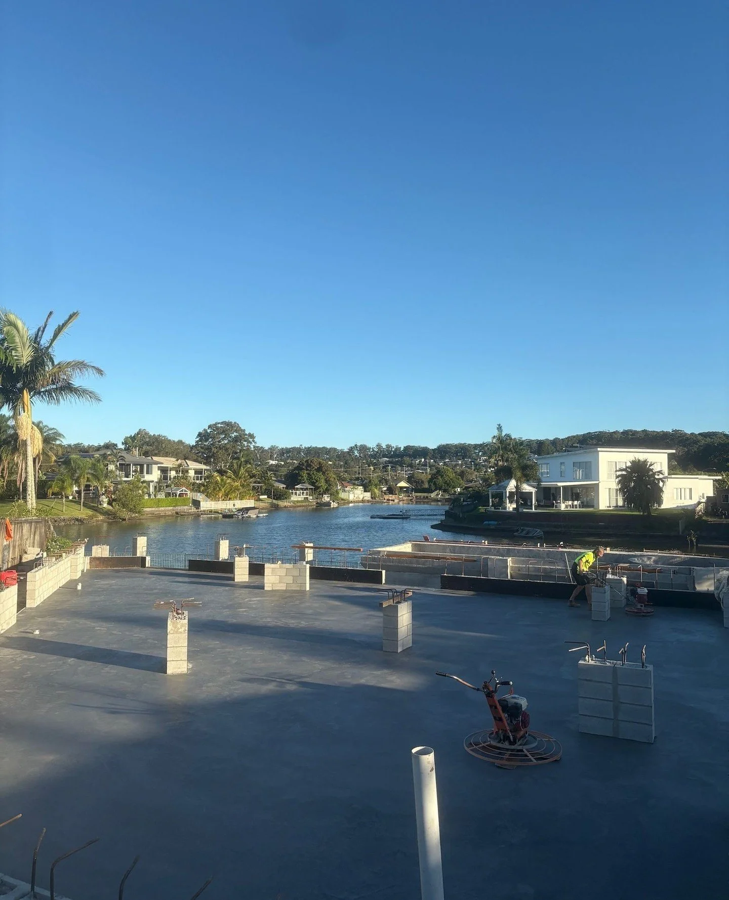 Bottom slab down in Currumbin Waters ☑️ Burnished finish. The foundation of what's going to be a stunning canal home. Swipe to see the before. ⁠
📷️ @hipeemediaau