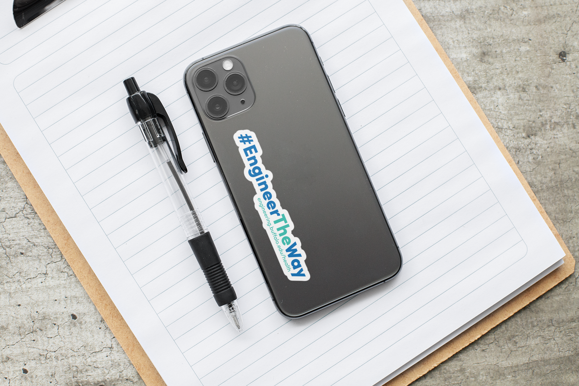 sticker-mockup-featuring-a-phone-and-stationery-items-33607.png