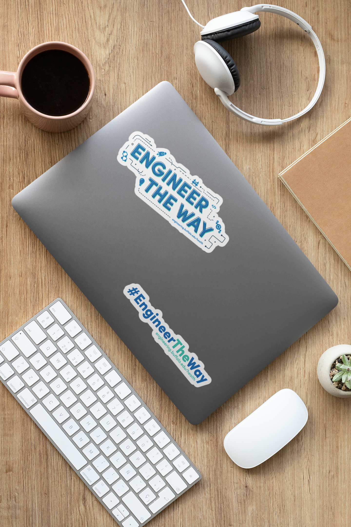 sticker-mockup-featuring-a-laptop-on-a-wooden-desk-33602.png