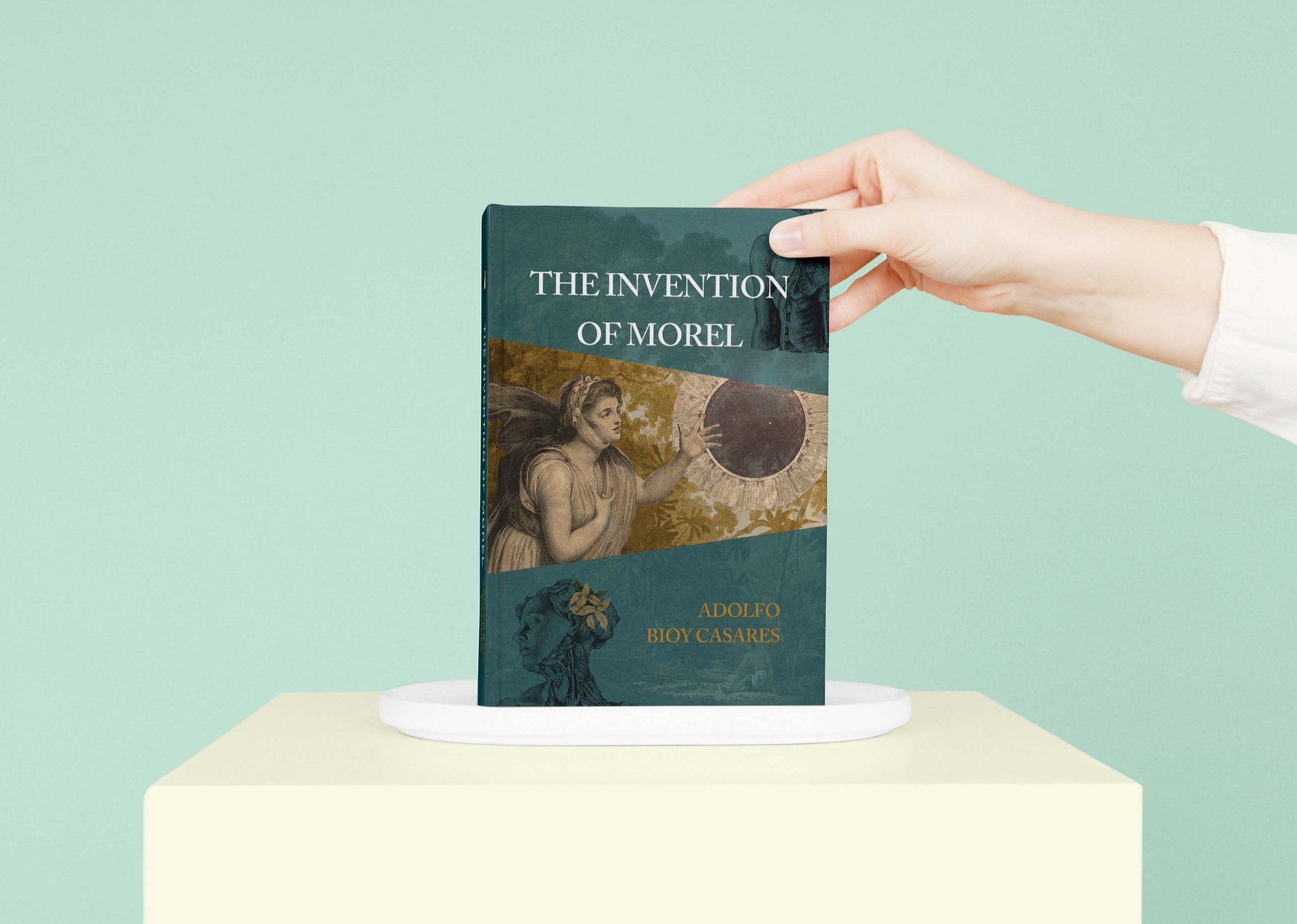 Notebook+with+Hand+Mockup.jpg