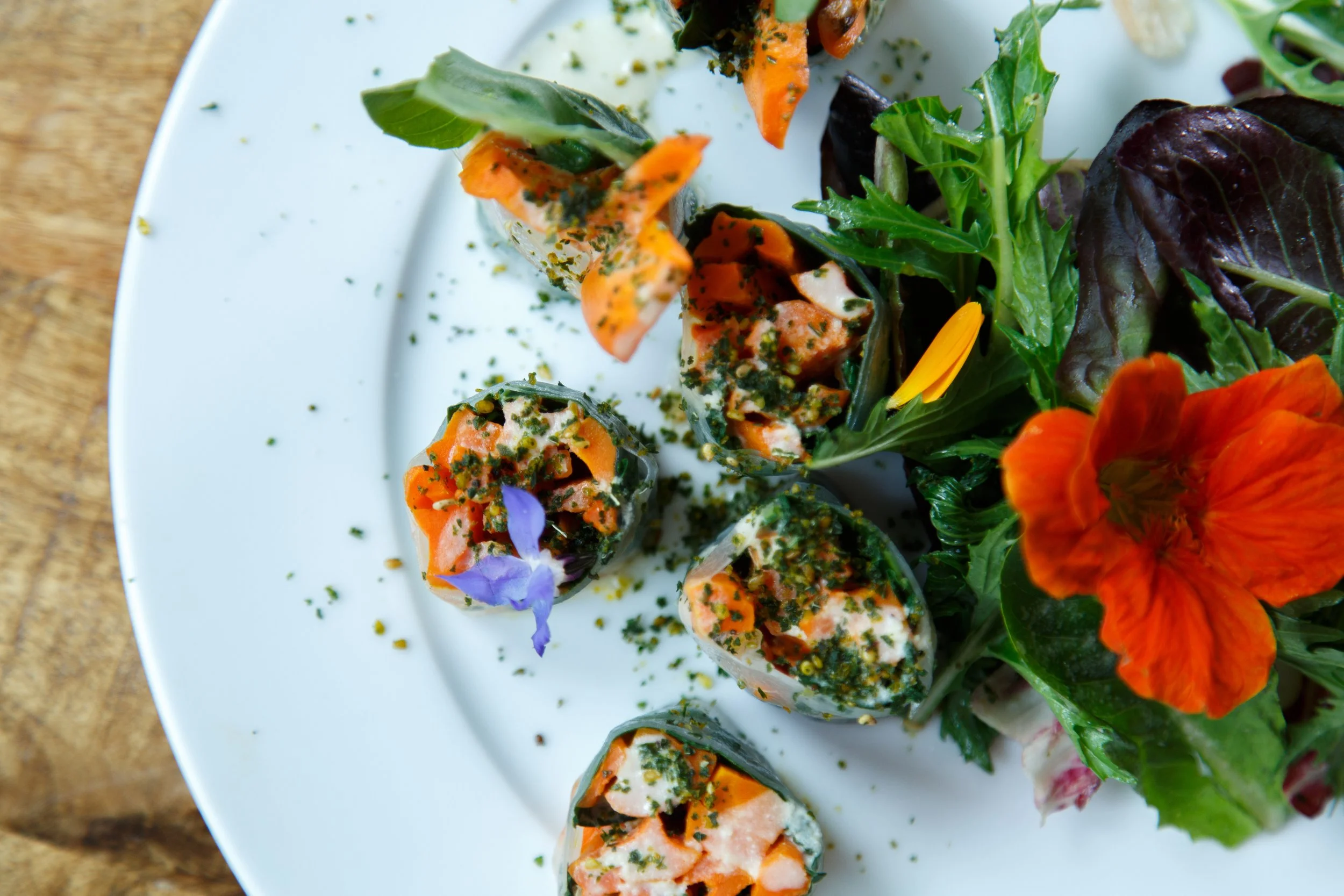 Color fresh salad on a white plate.