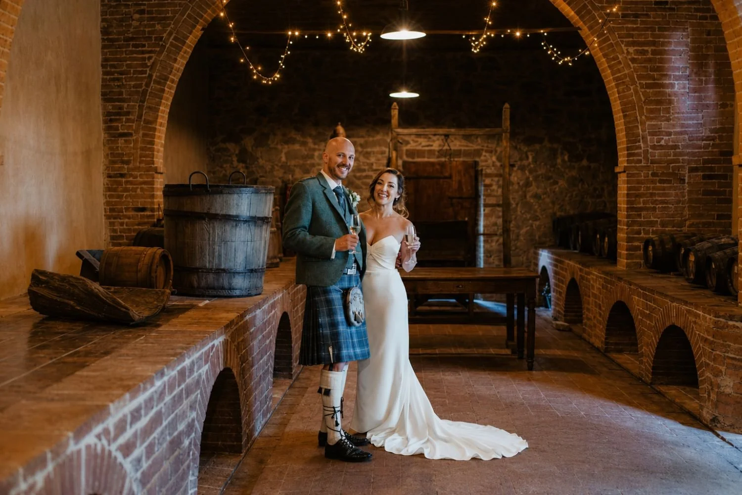 Custom strapless bridal gown with front pleat detail from the minimalist package