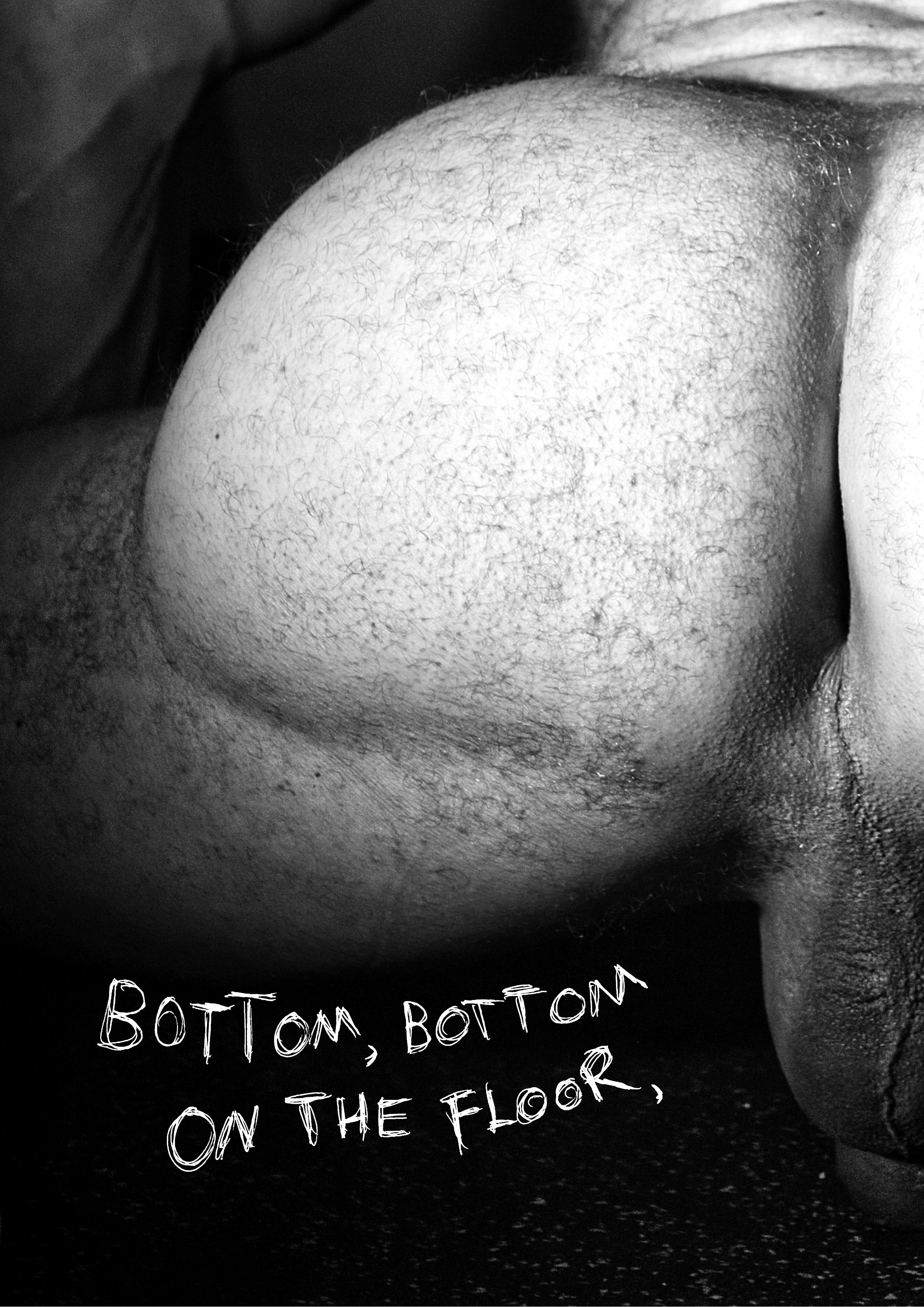 Close-up of a person's buttocks, with a handwritten text overlay that says 'Bottom, Bottom on the Floor' in white letters.