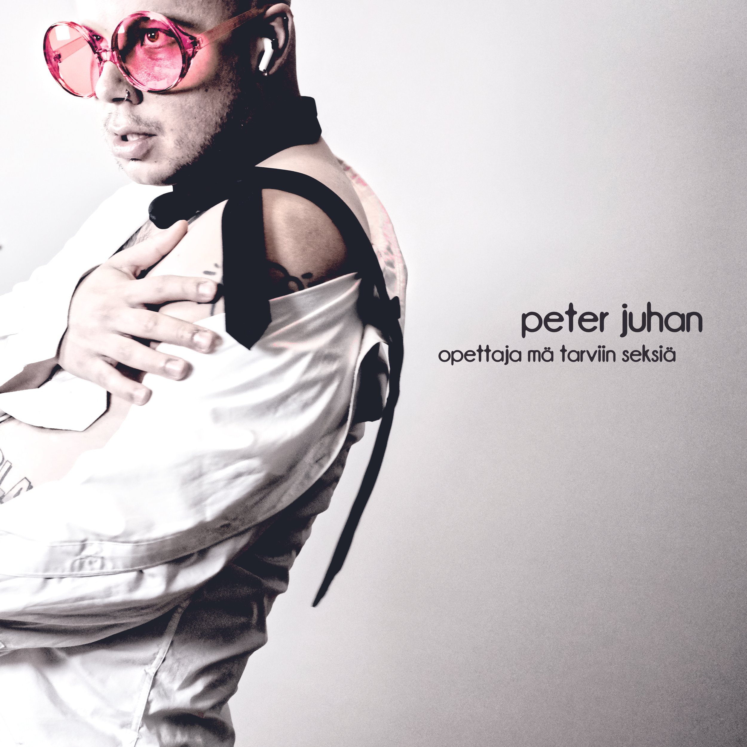 Album cover featuring Peter Juhan in sunglasses and a jacket, with text 'peter juhan' and 'opettaja mä tarviin seksiä'.